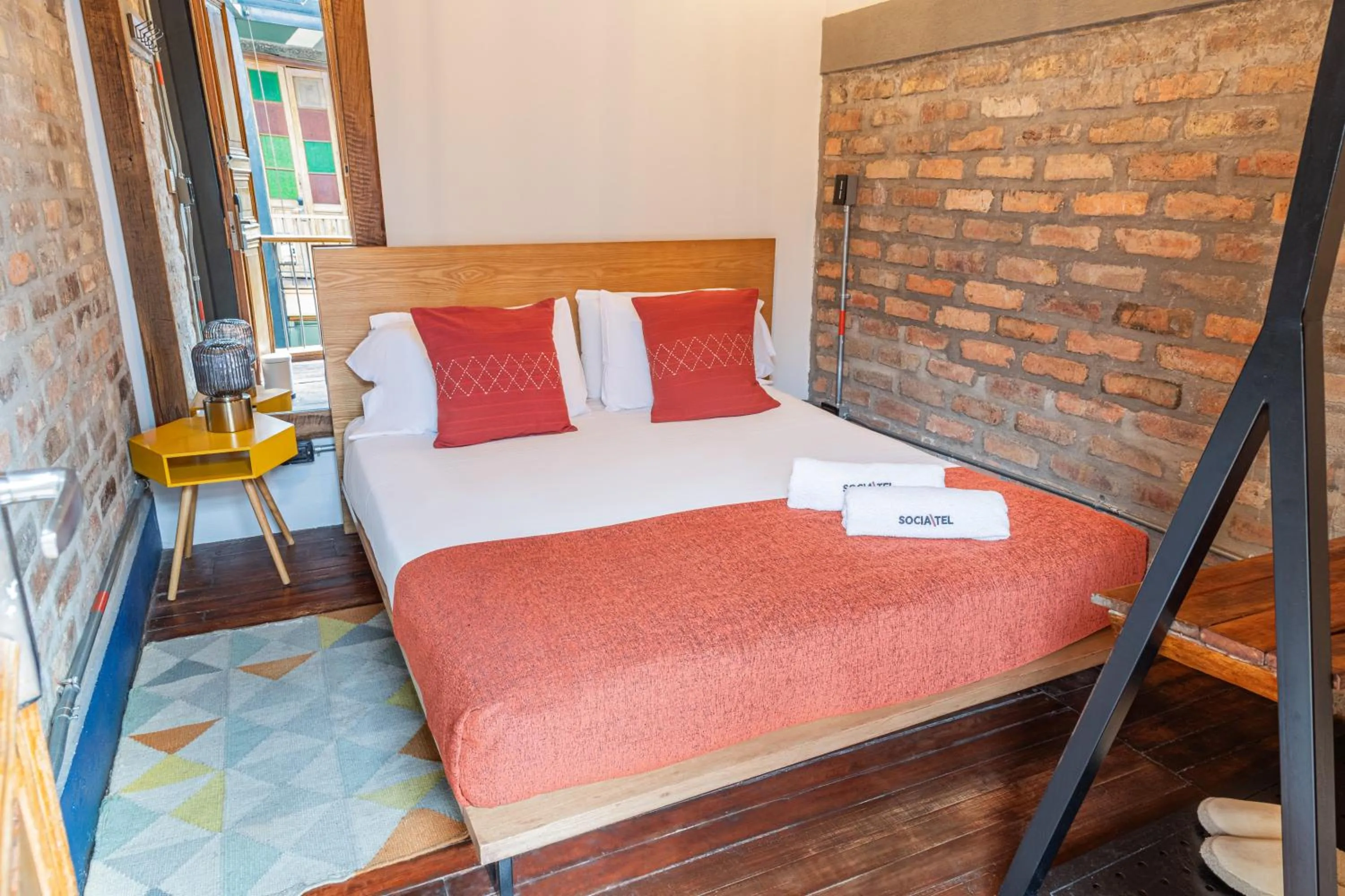 Bed in Delgadillo Hotel by Socialtel