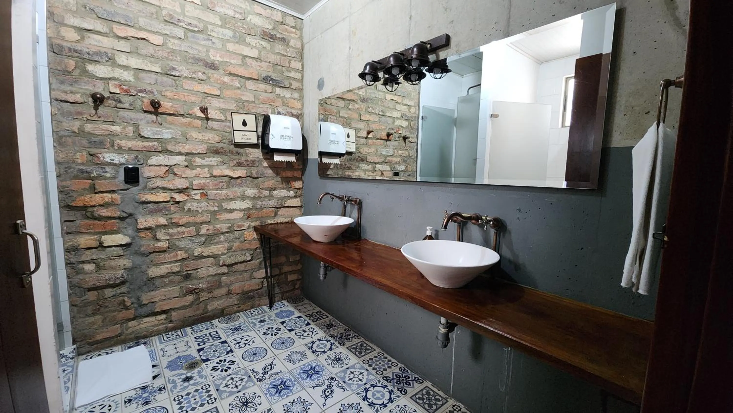 Bathroom in Delgadillo Hotel by Socialtel