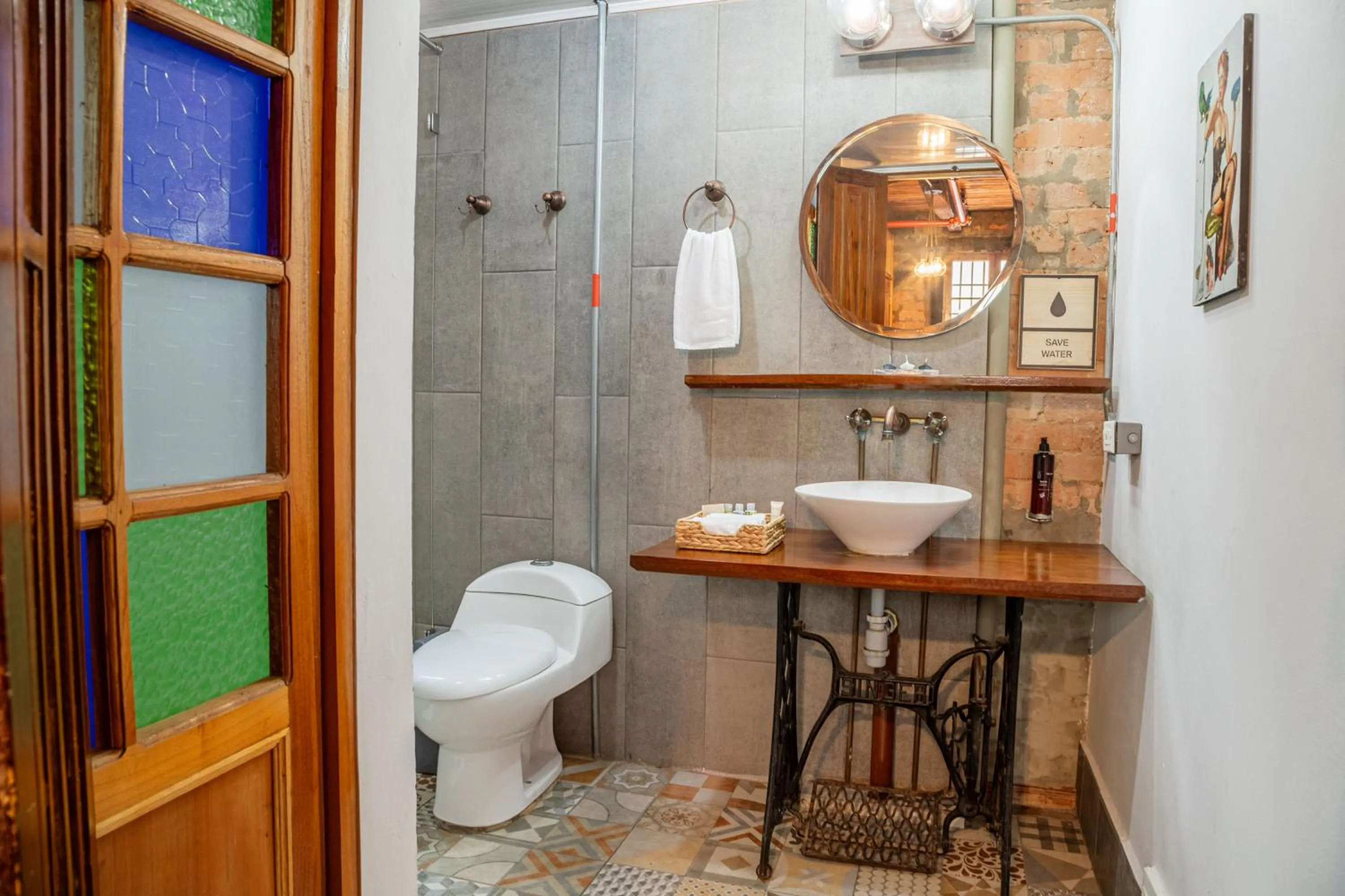Bathroom in Delgadillo Hotel by Socialtel