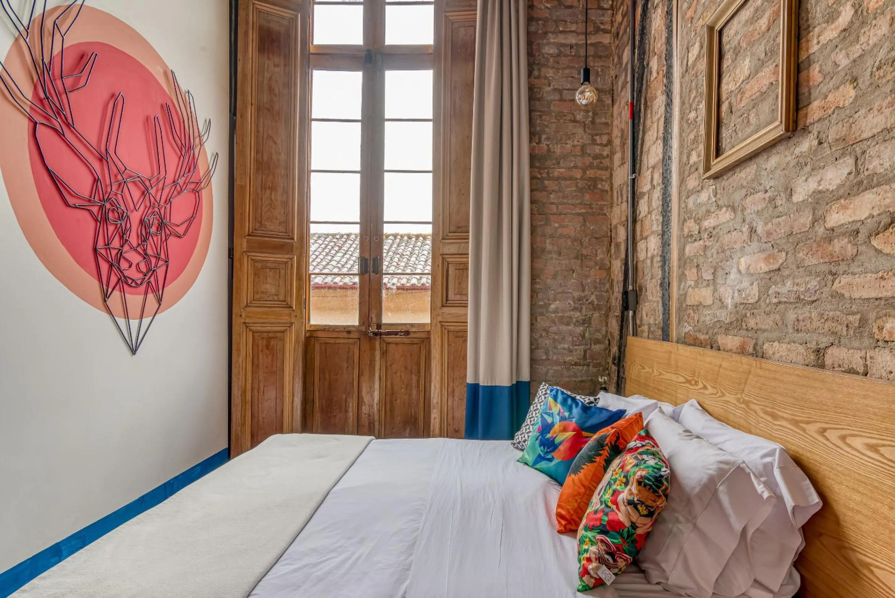 Bed in Delgadillo Hotel by Socialtel