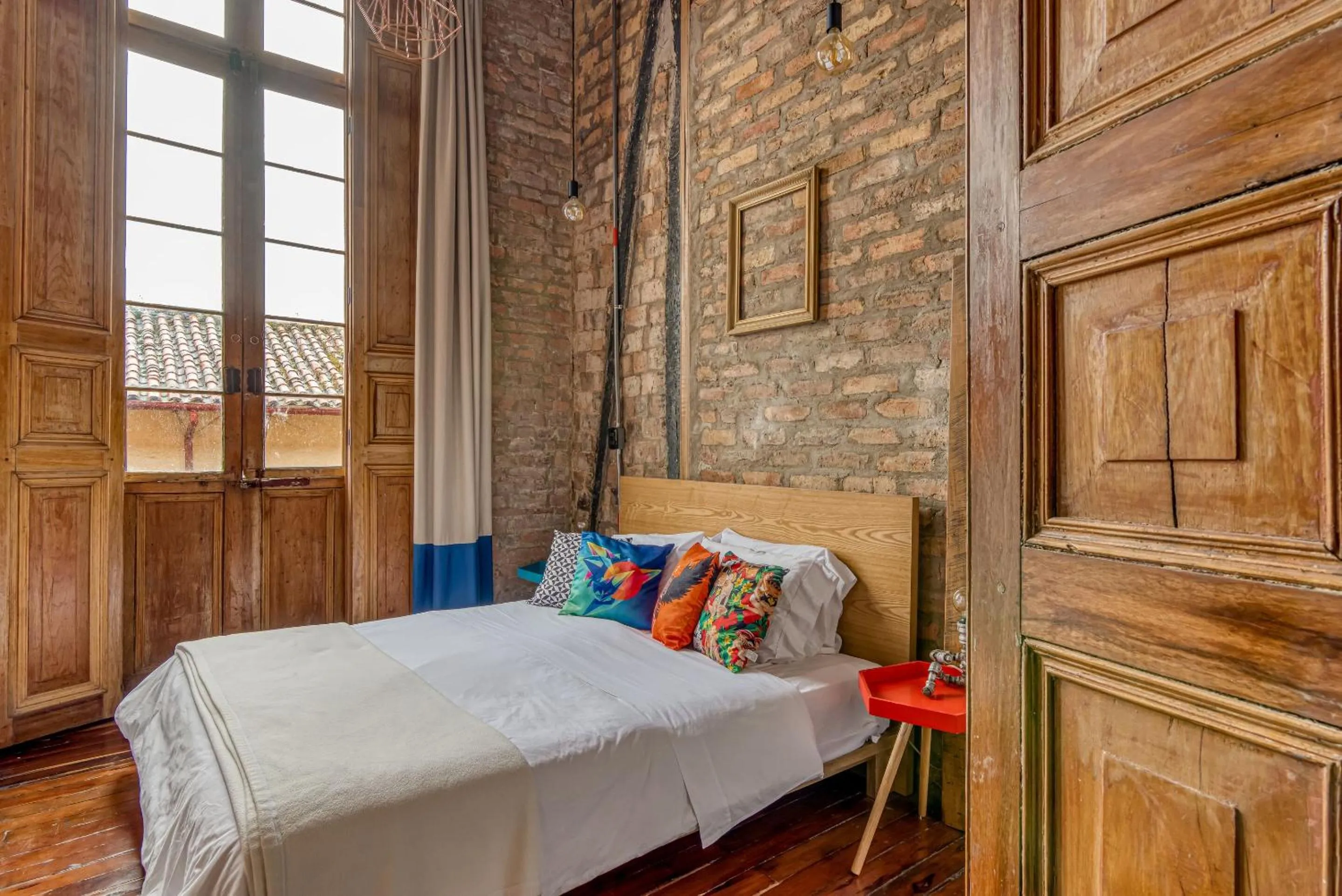 Bed in Delgadillo Hotel by Socialtel