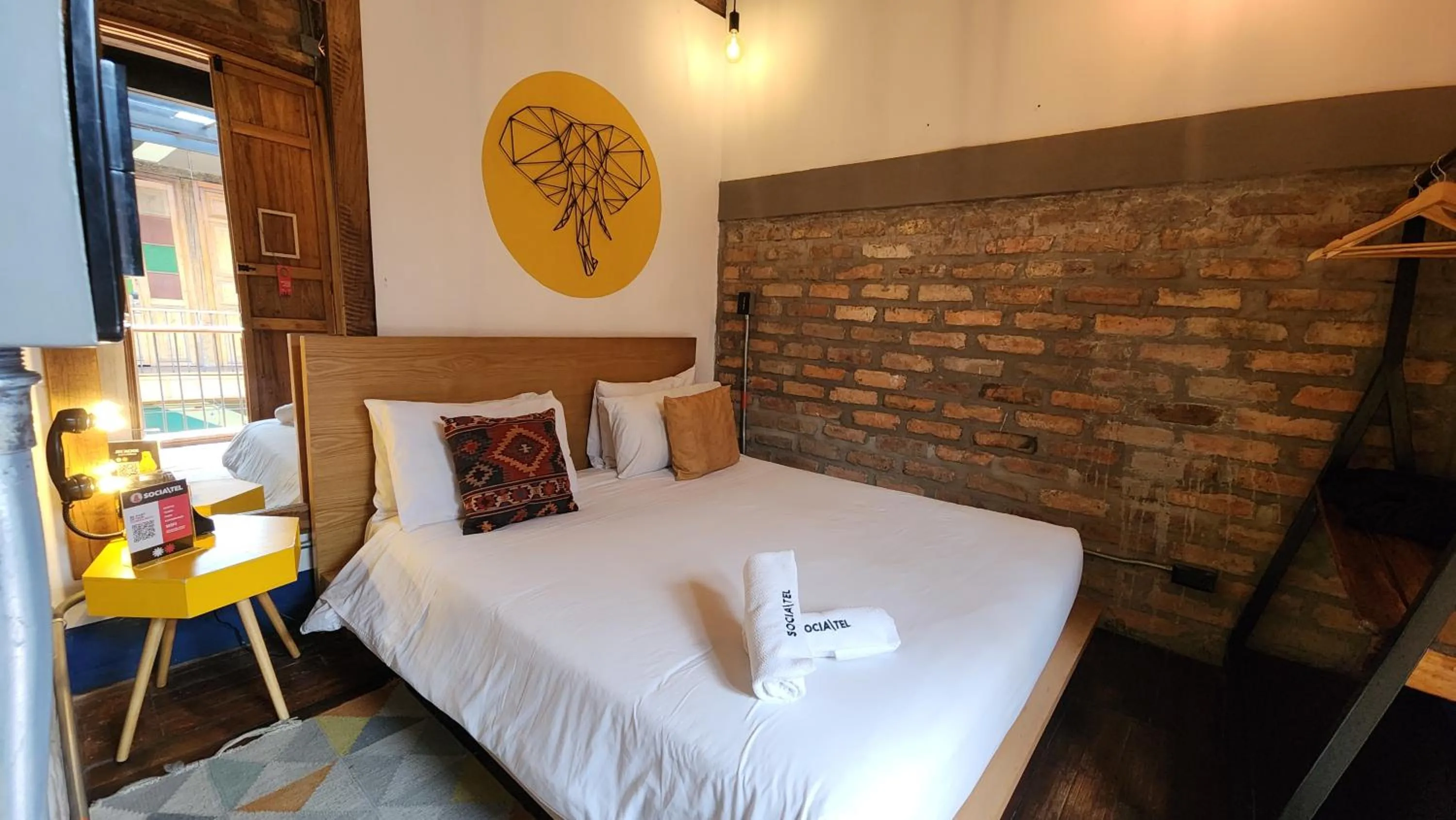 Bed in Delgadillo Hotel by Socialtel