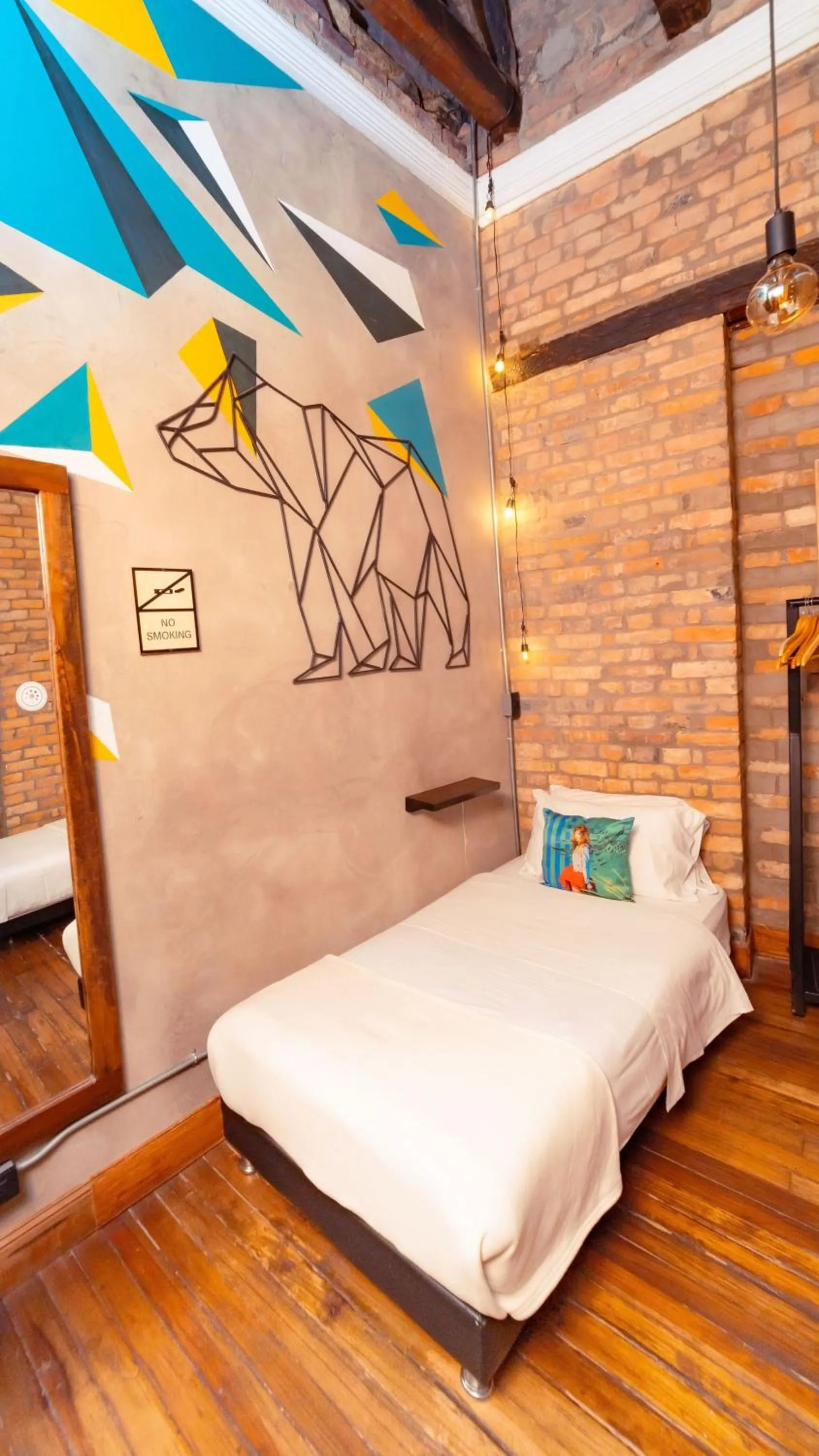 Bed in Delgadillo Hotel by Socialtel