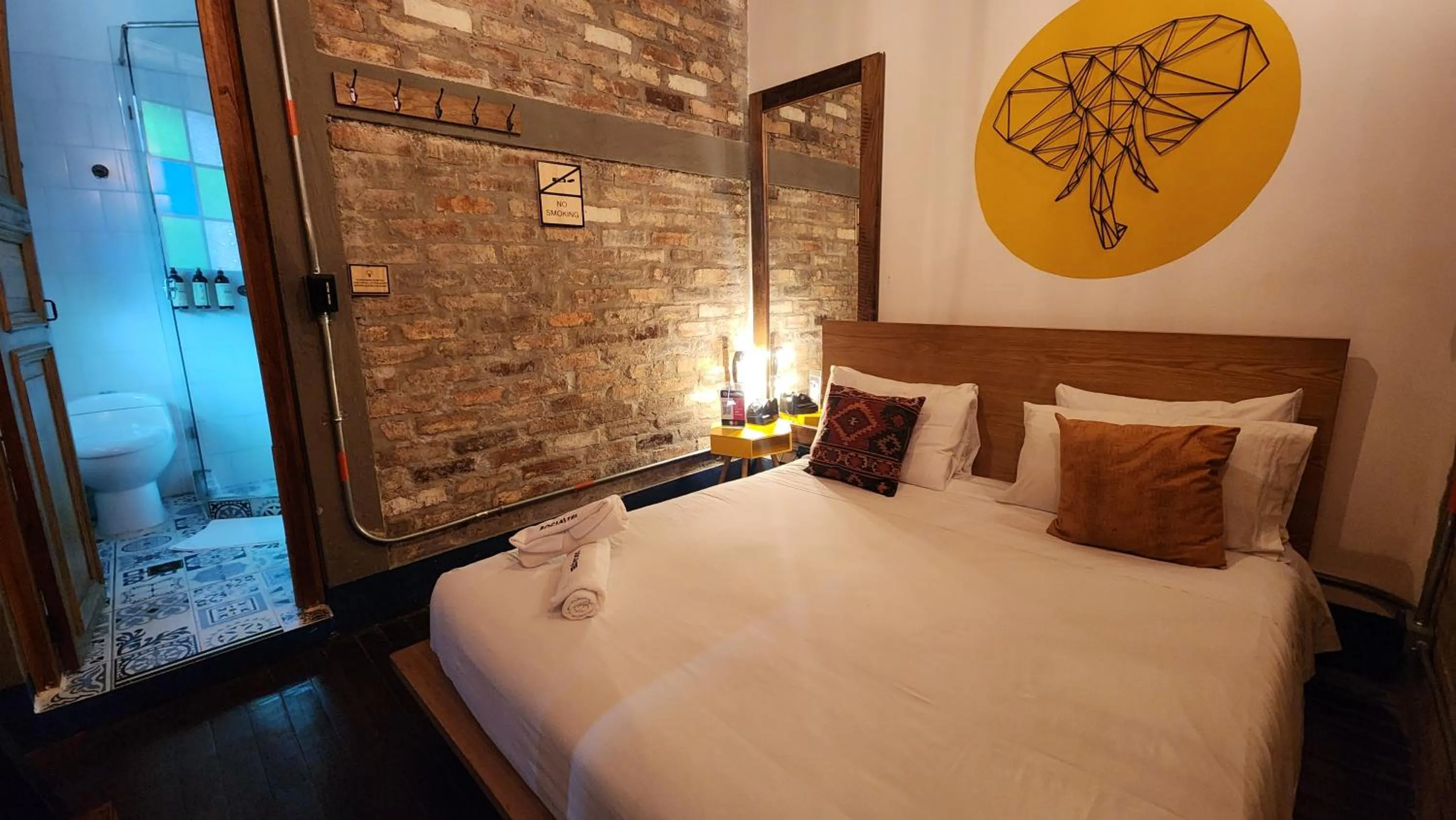 Bed in Delgadillo Hotel by Socialtel