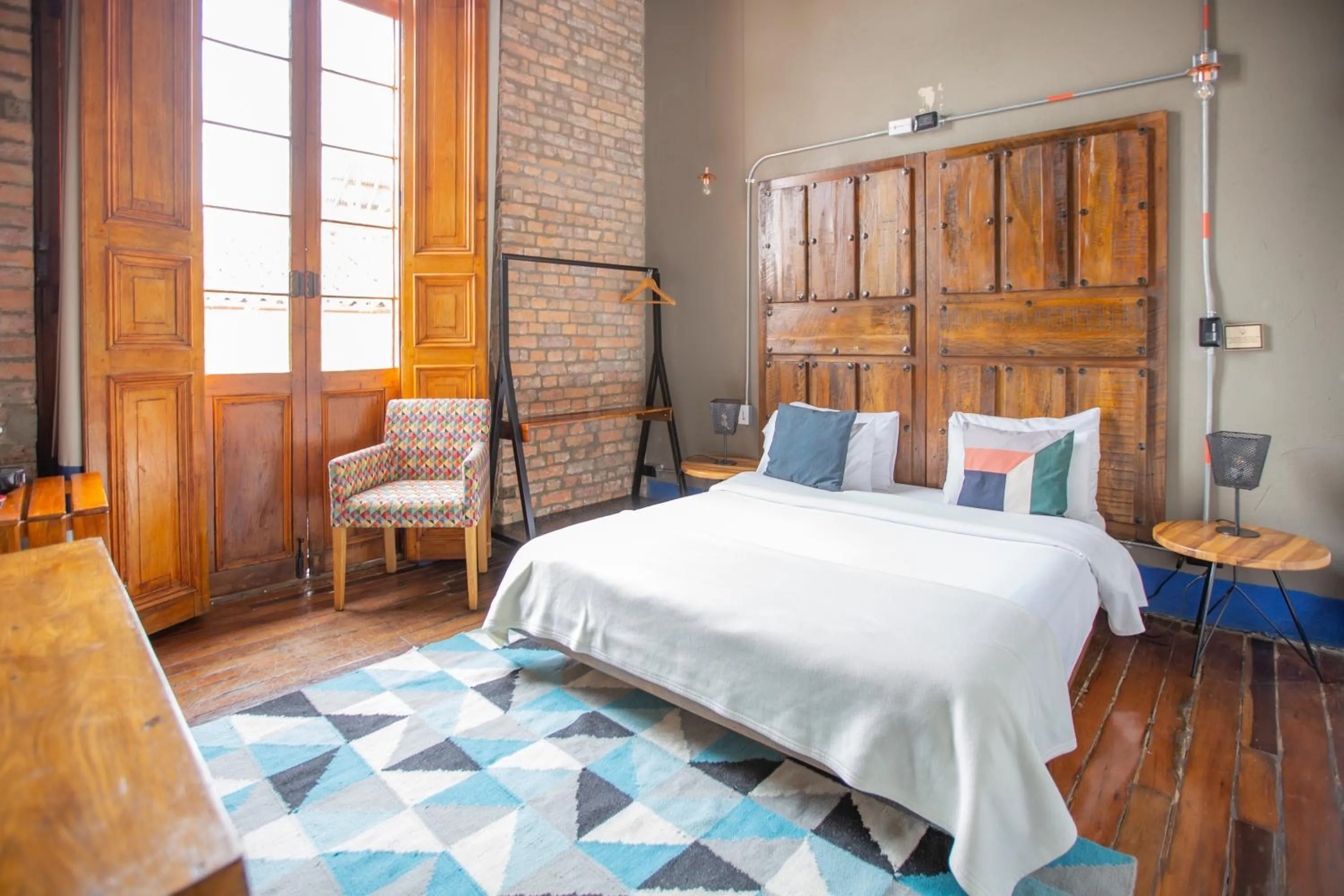 Bed in Delgadillo Hotel by Socialtel