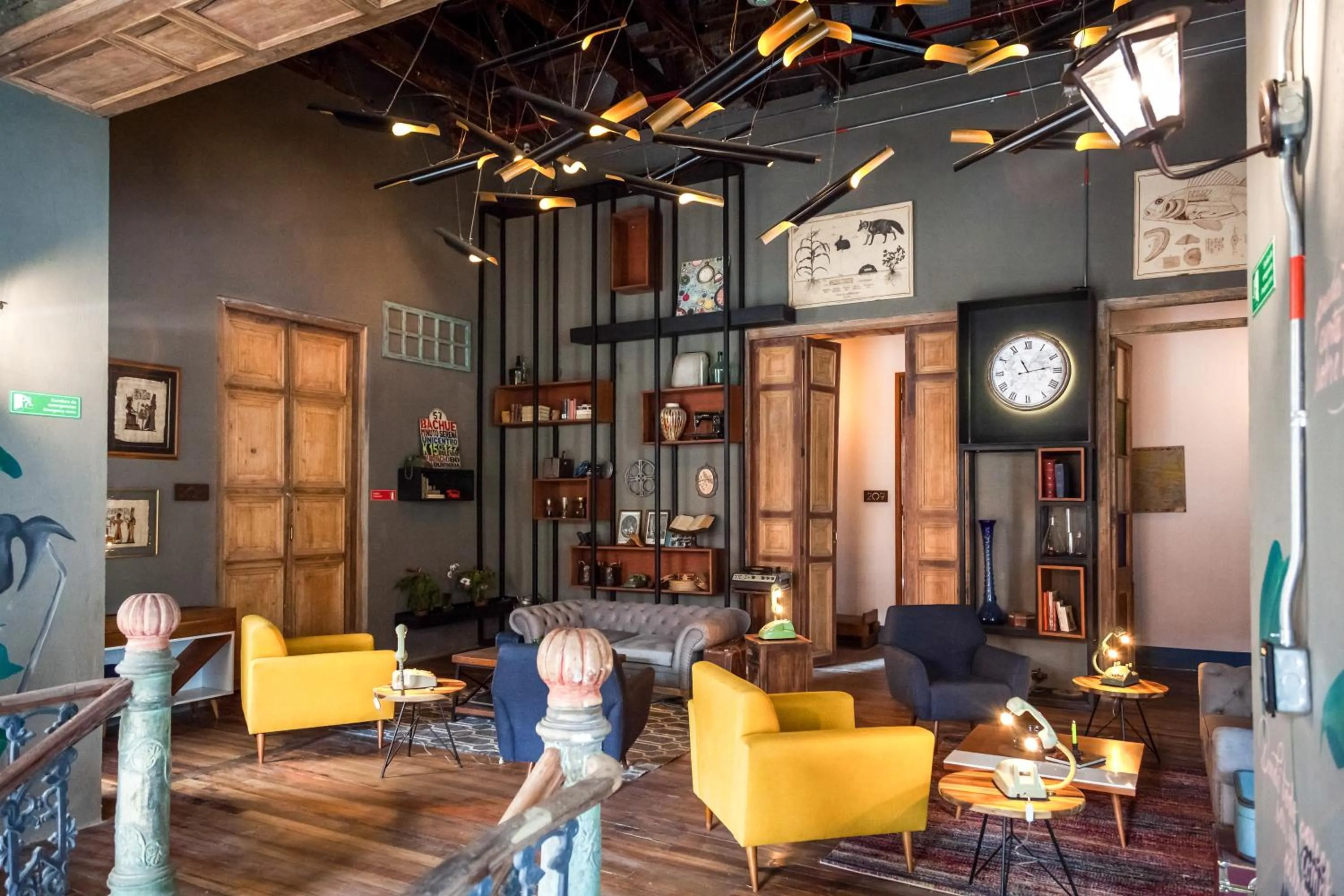 Library in Delgadillo Hotel by Socialtel