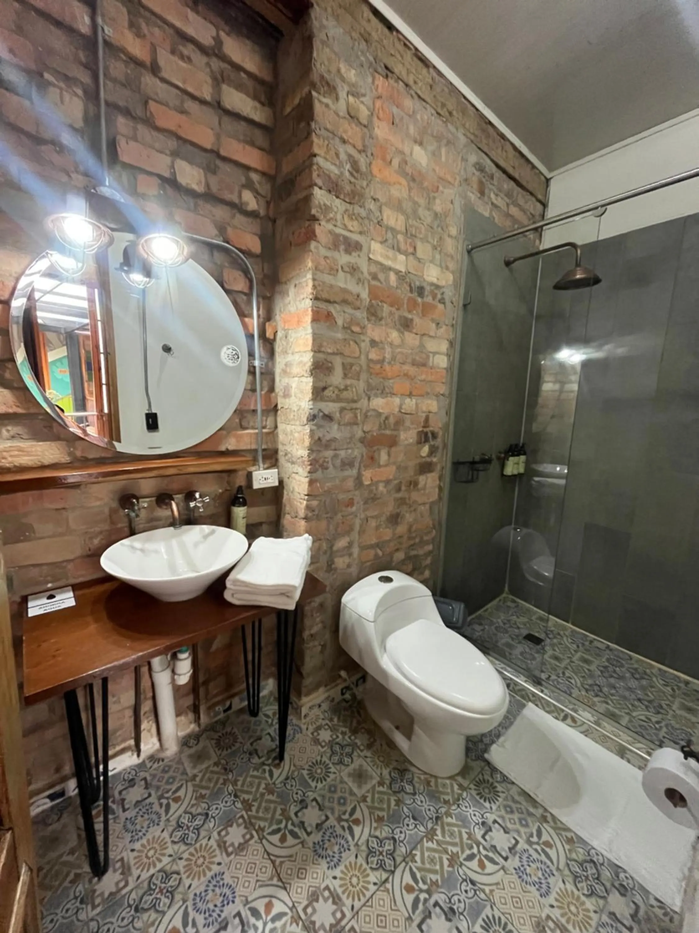 Bathroom in Delgadillo Hotel by Socialtel