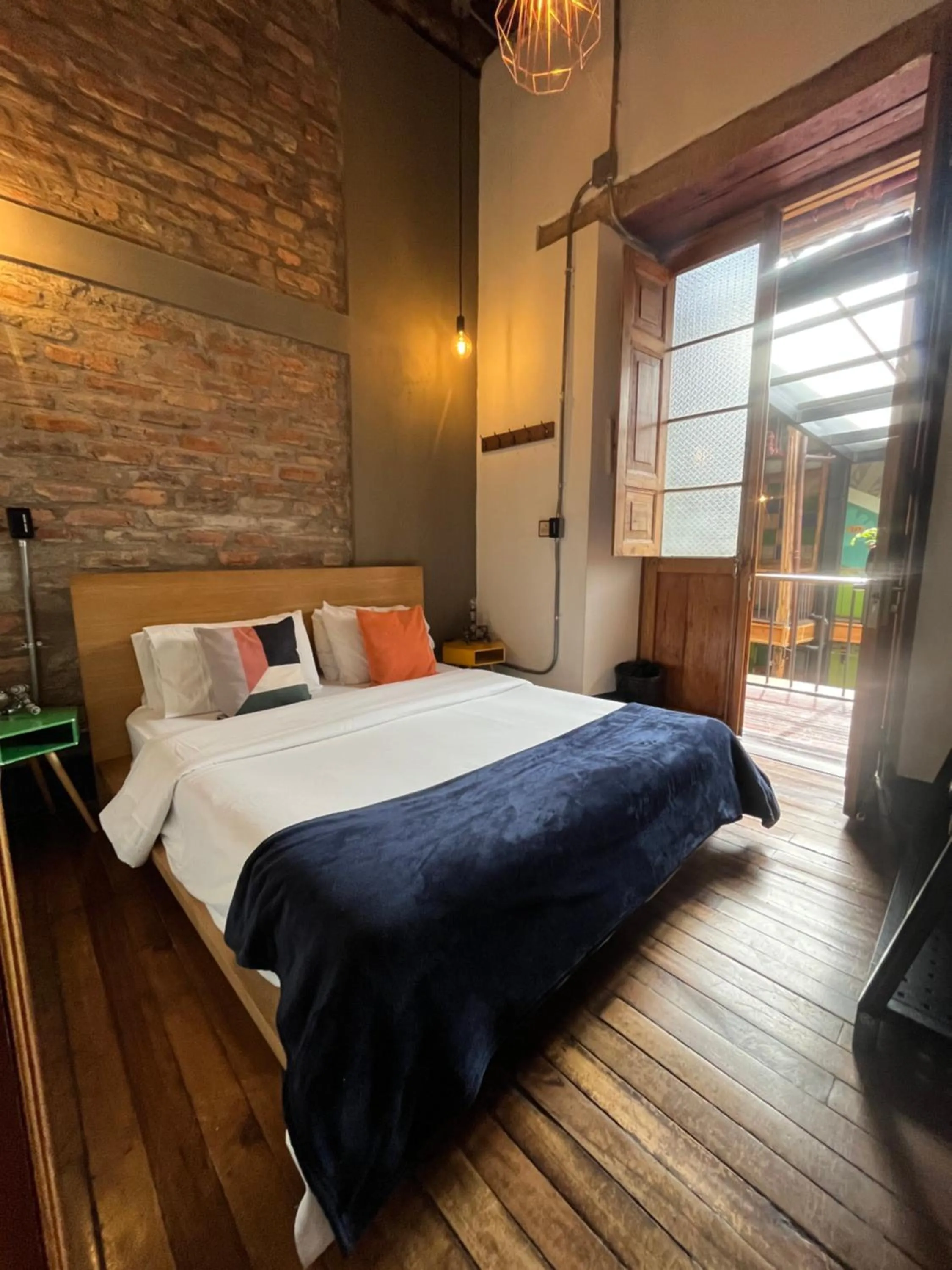Bedroom, Bed in Delgadillo Hotel by Socialtel
