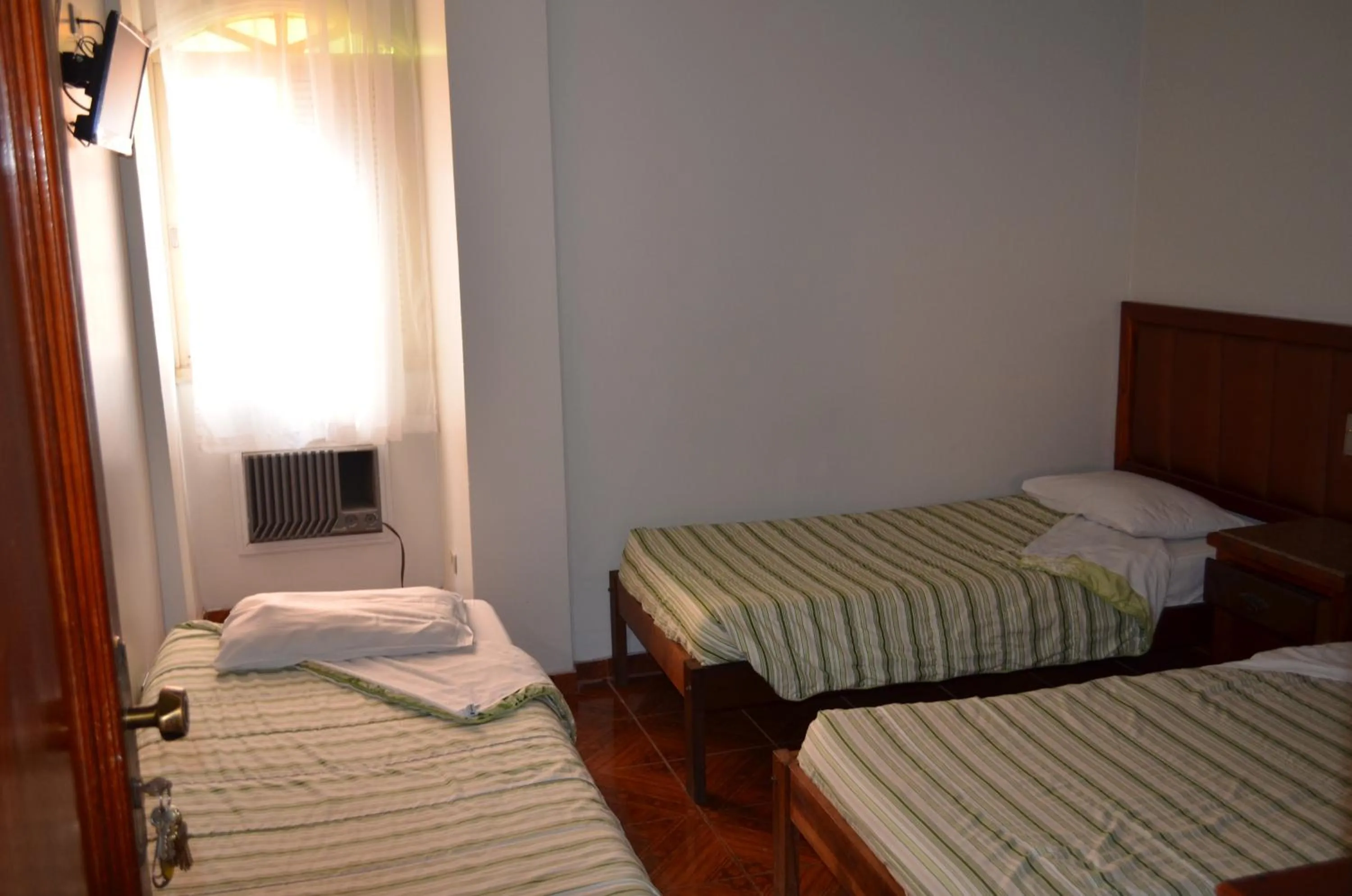 Day, Bed in Reinales Plaza Hotel