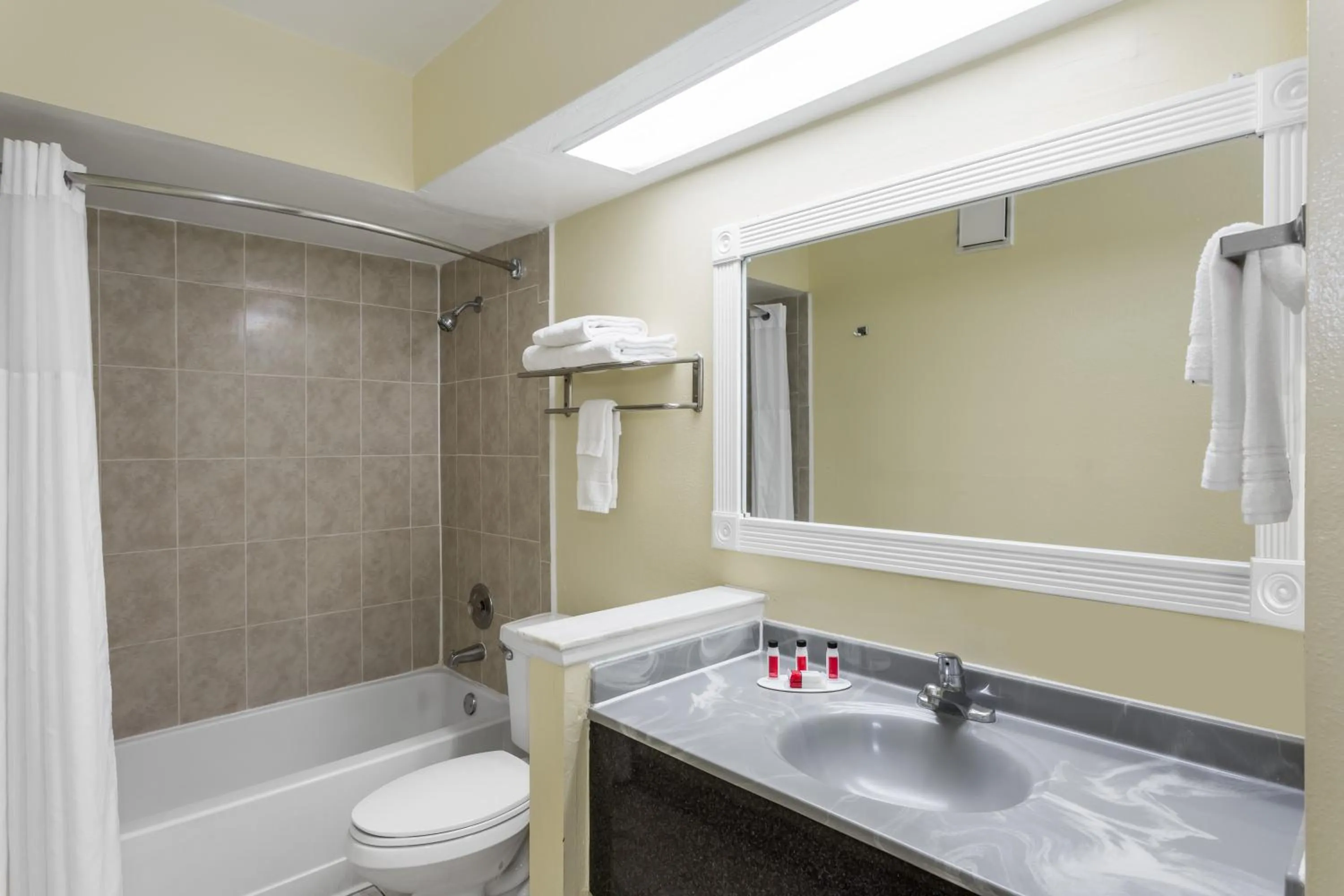 Bathroom in Days Inn & Suites by Wyndham Port Richey