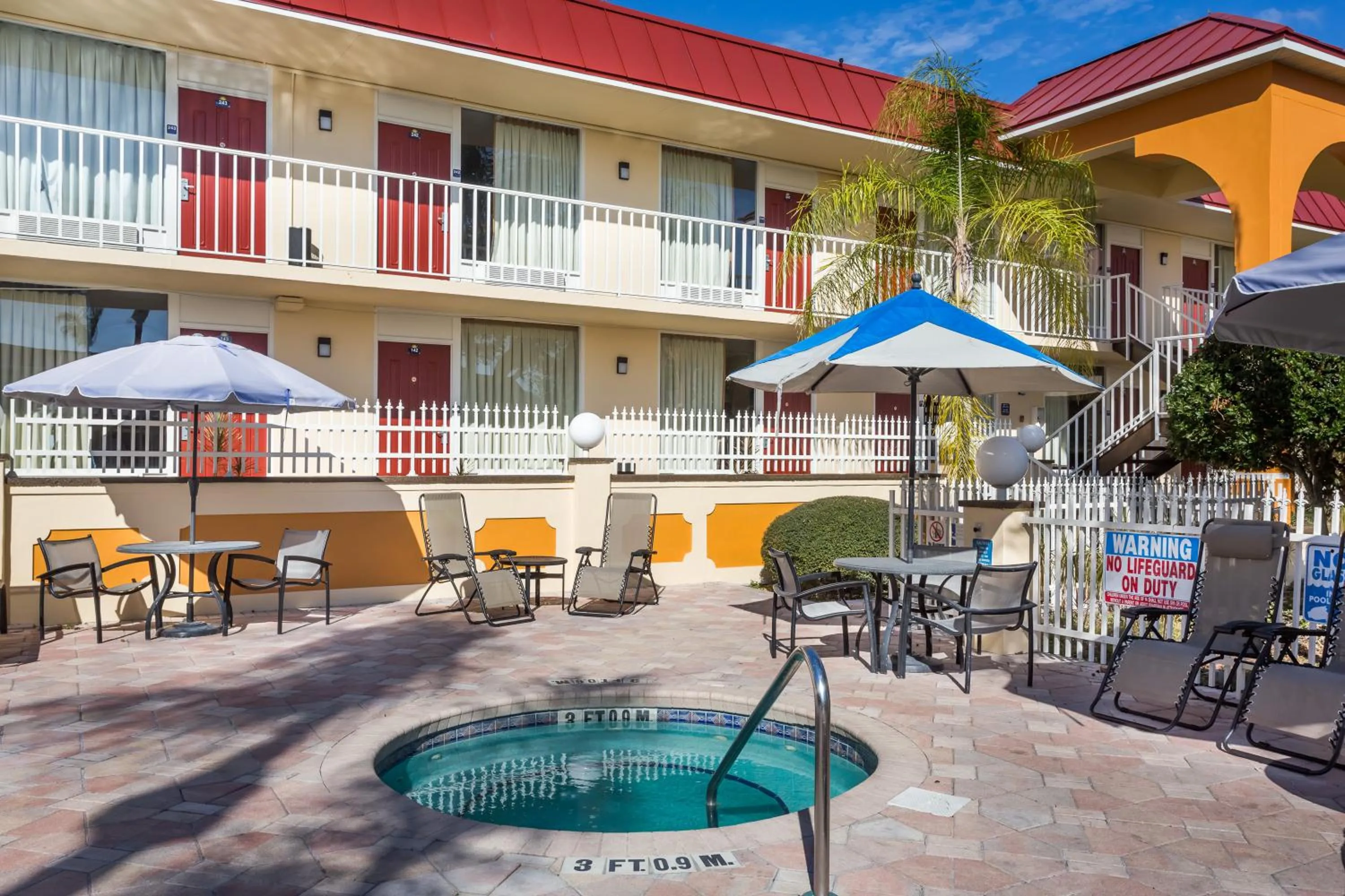 Swimming pool in Days Inn & Suites by Wyndham Port Richey