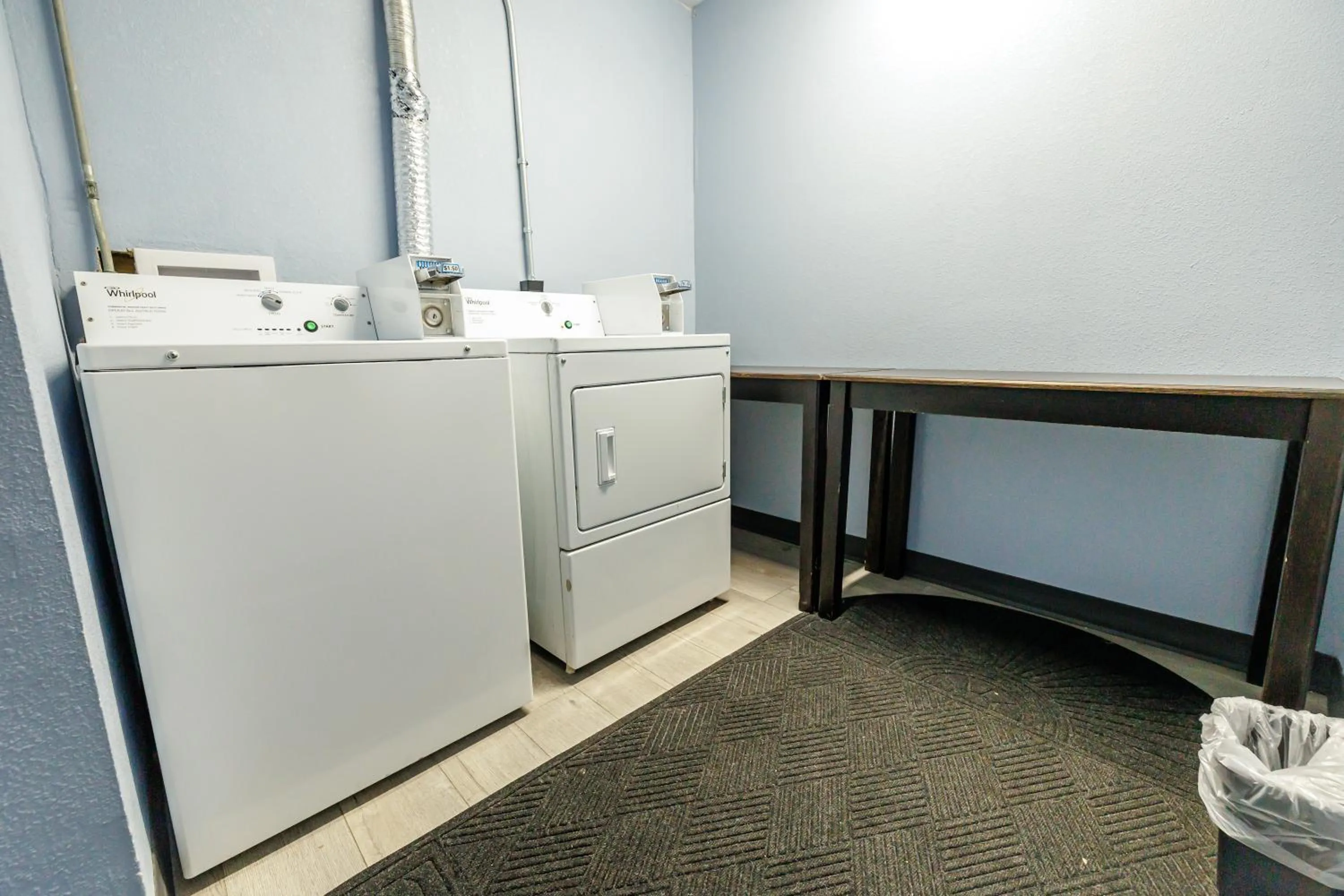 washing machine in New Victorian Inn & Suites Omaha