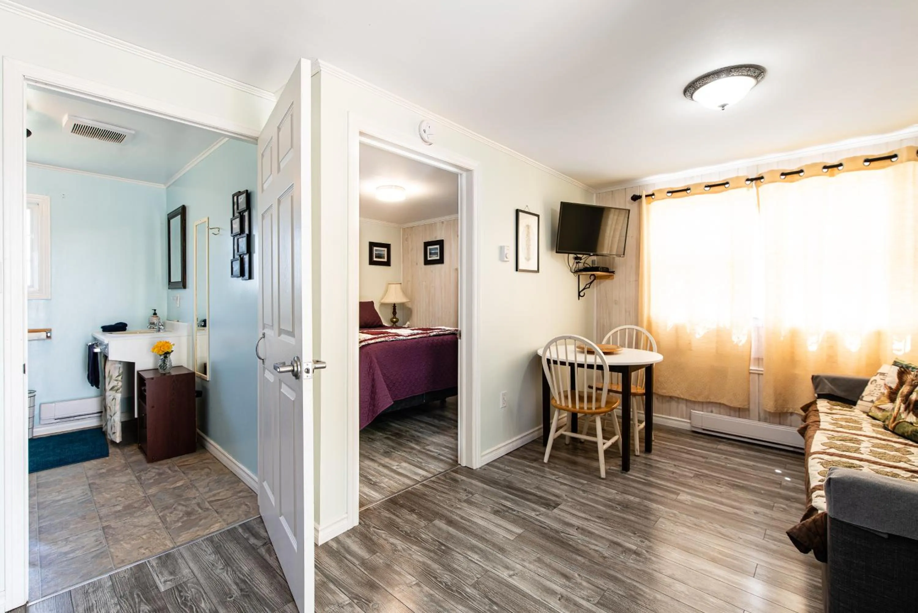 Bathroom, Bed in Out East B&B - Norris Point