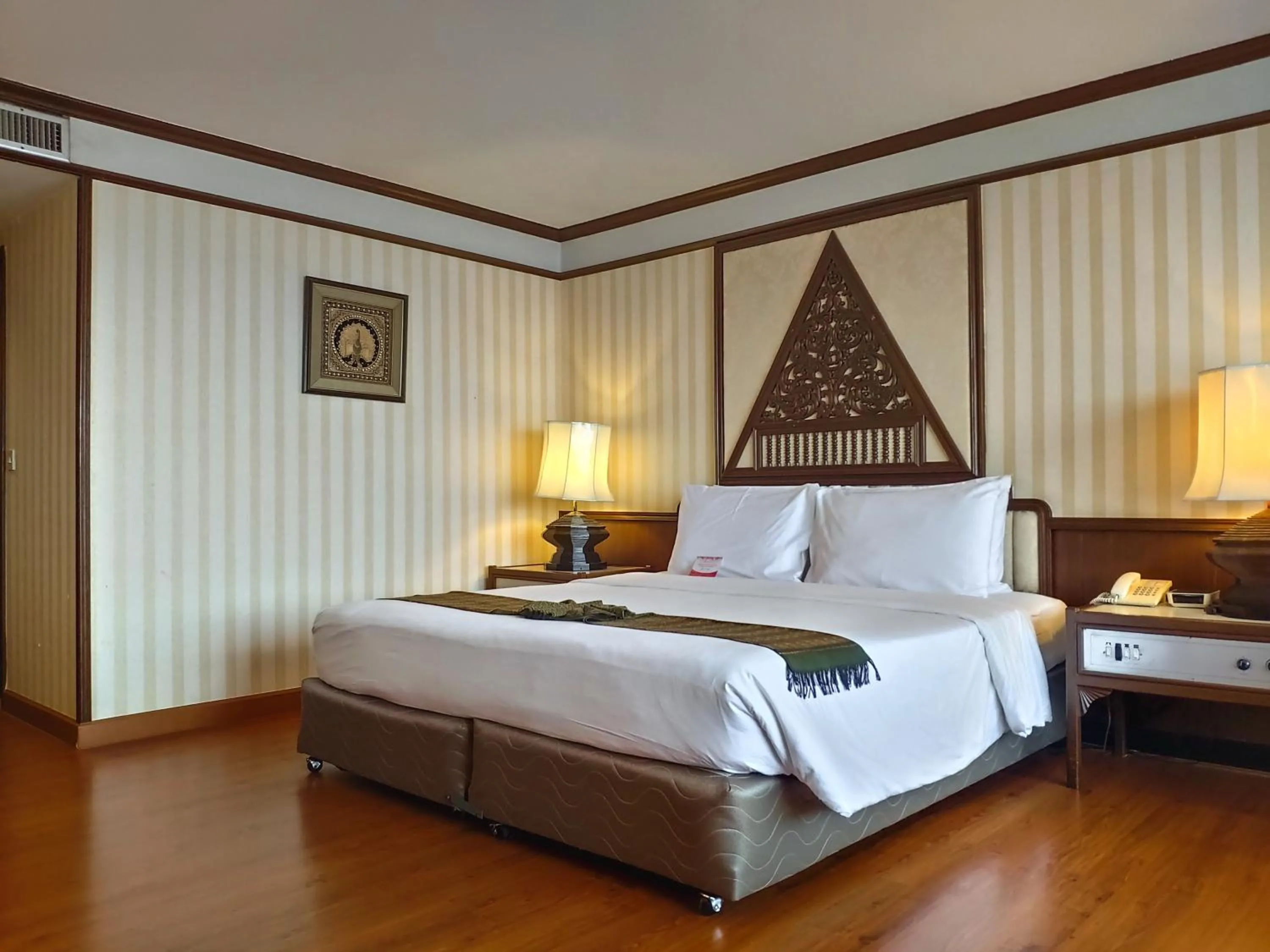 Bed in Chiang Mai Orchid Hotel