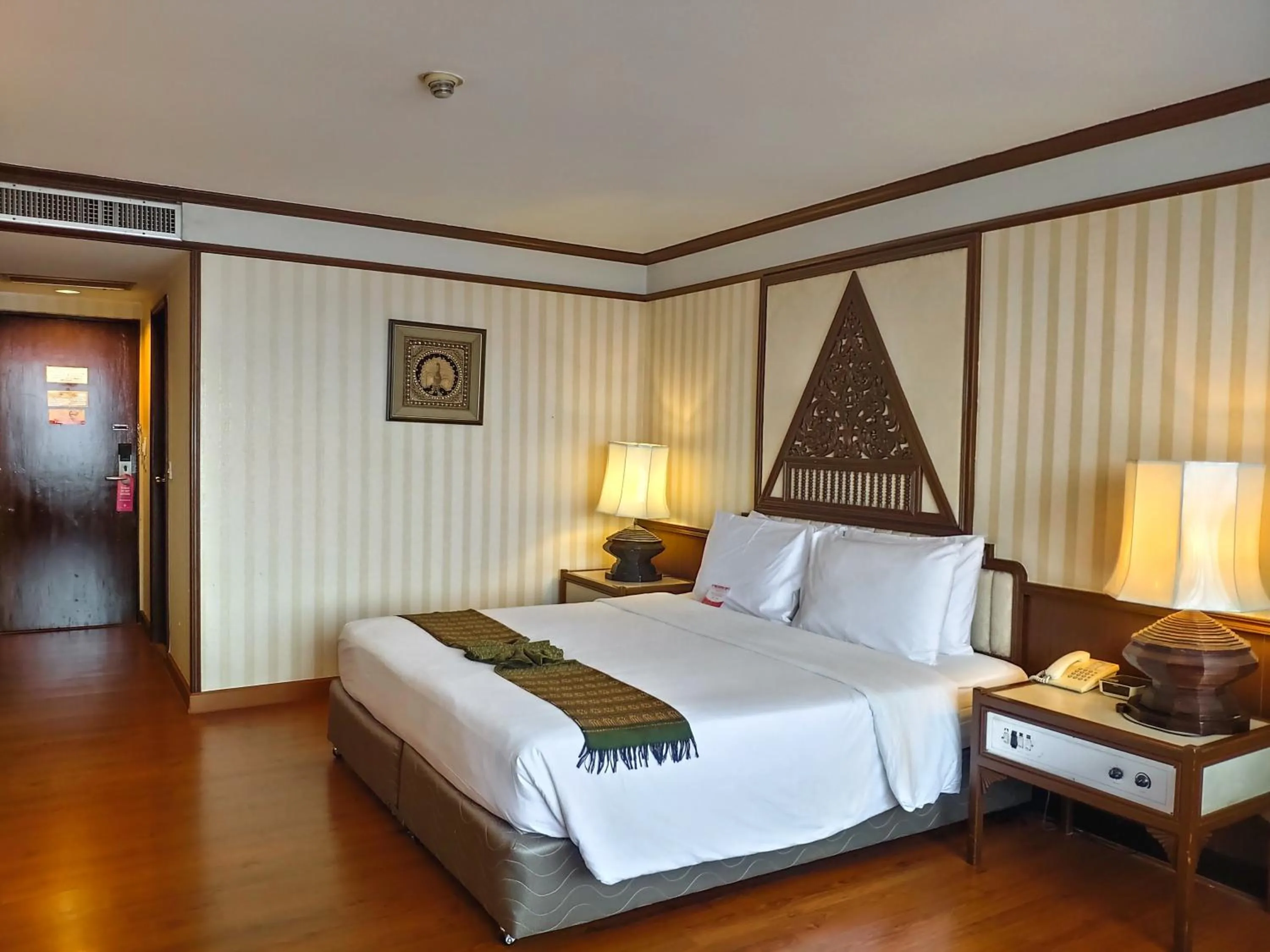 Bed in Chiang Mai Orchid Hotel