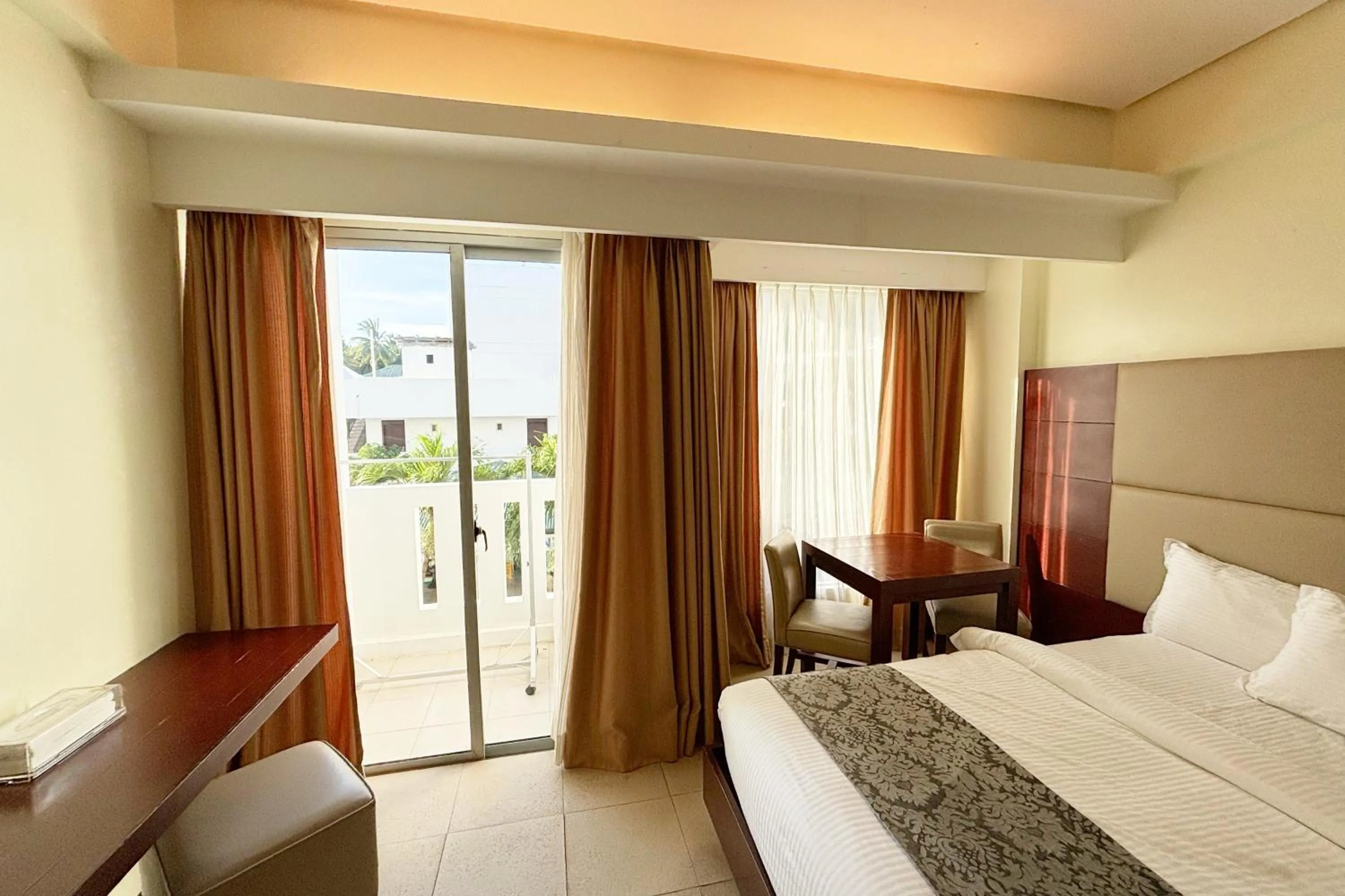 Bed in The Muse Beach Front Hotel Boracay