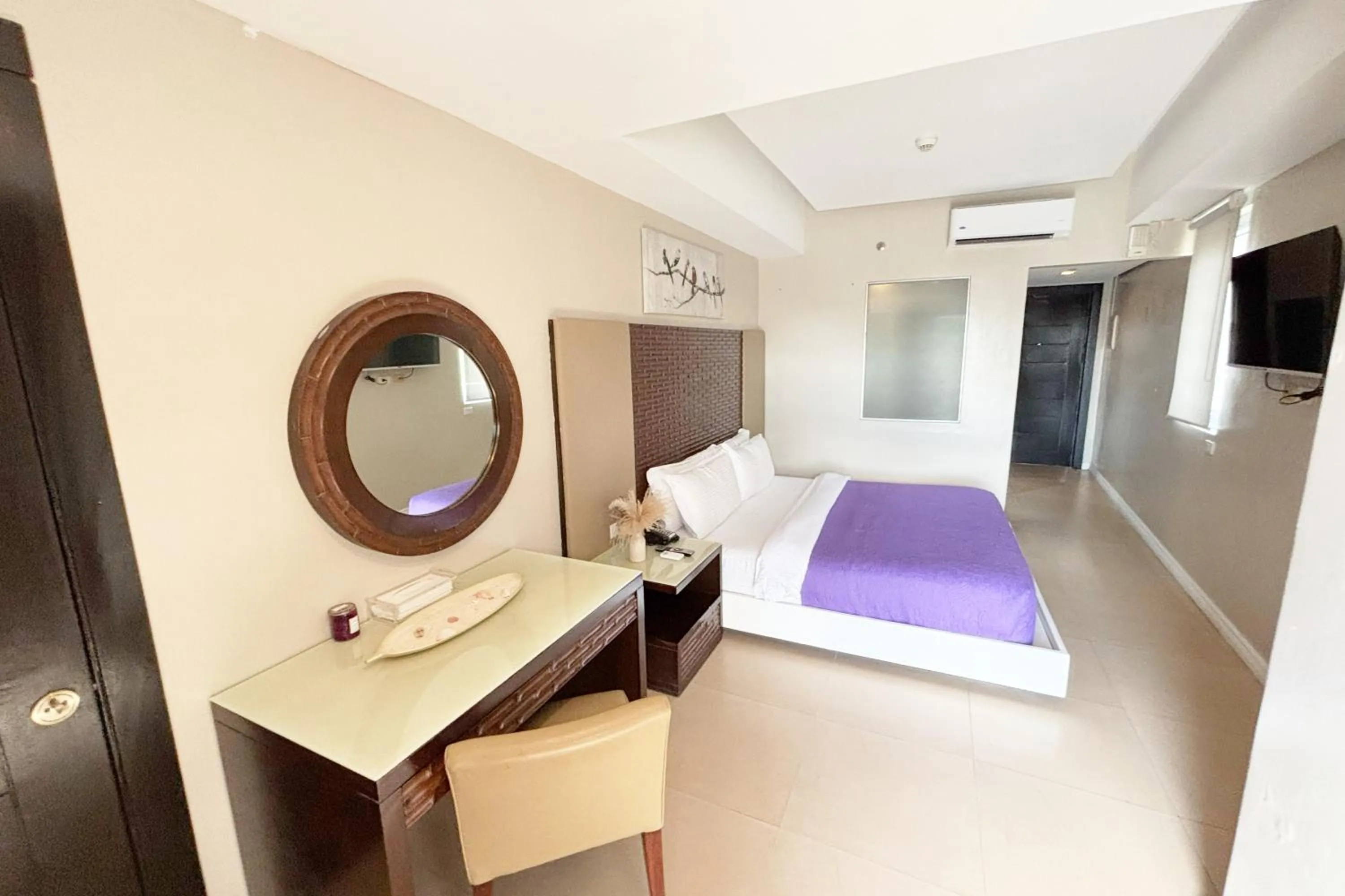 Bed in The Muse Beach Front Hotel Boracay