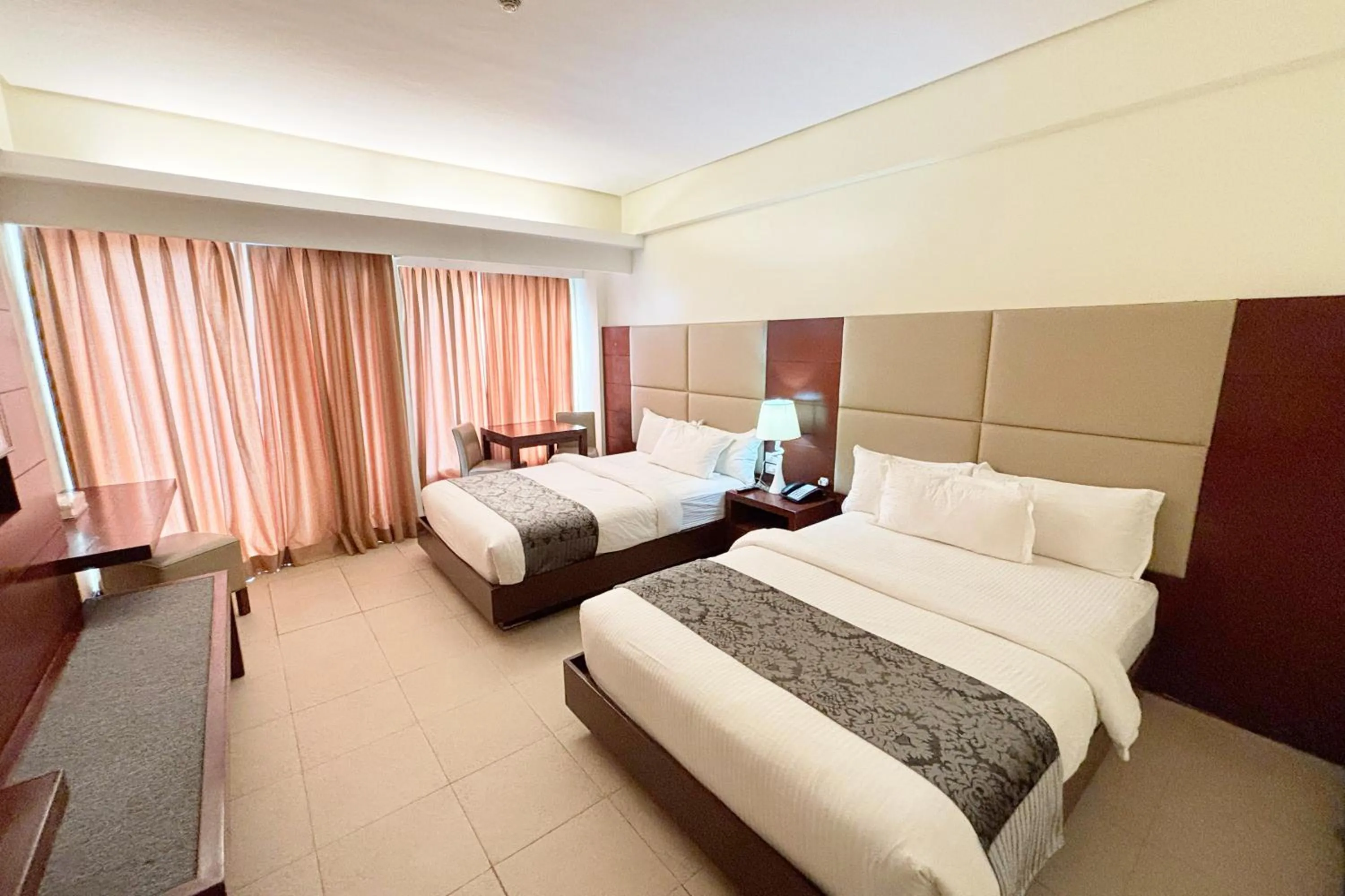 Bed in The Muse Beach Front Hotel Boracay