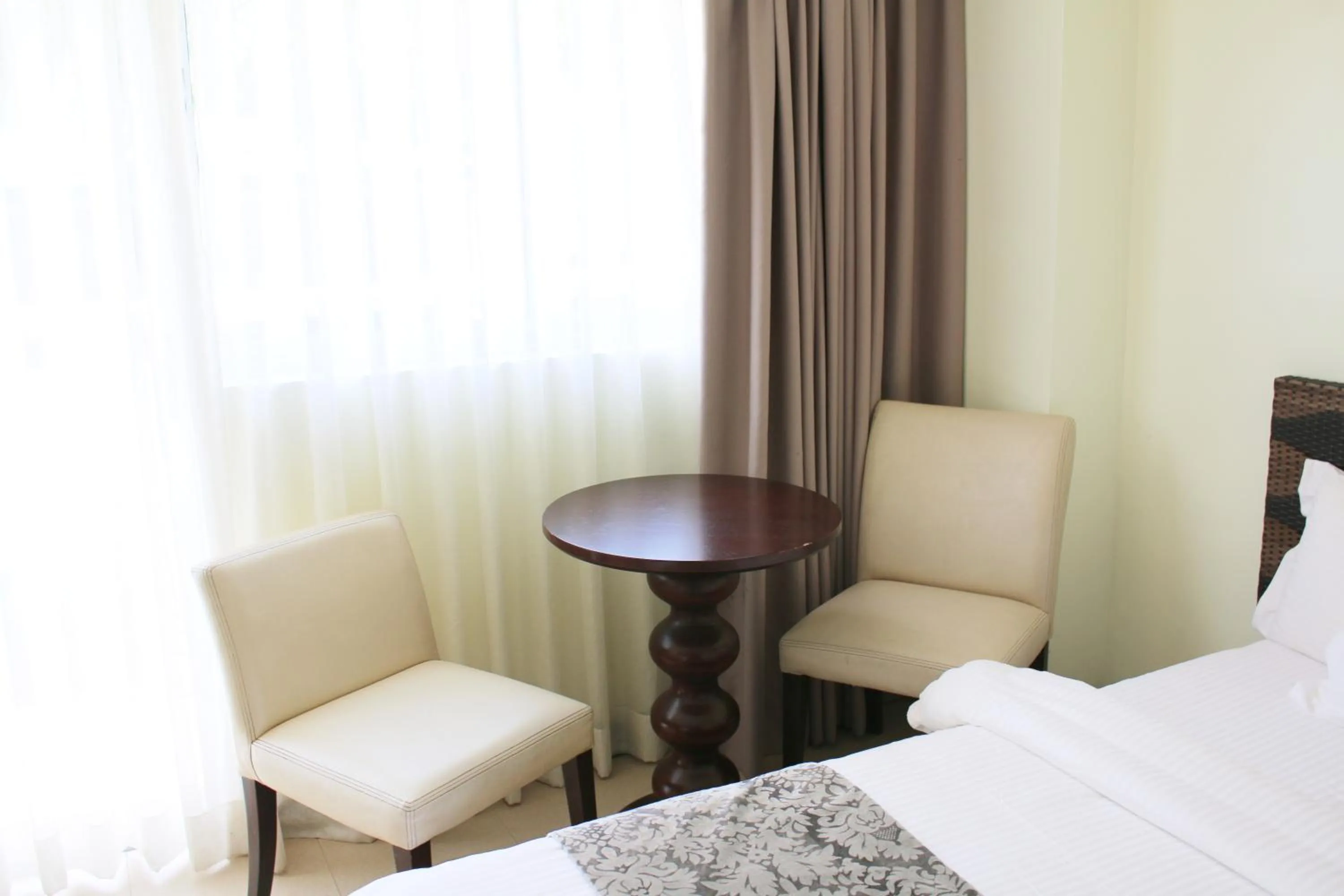 Bed in The Muse Beach Front Hotel Boracay