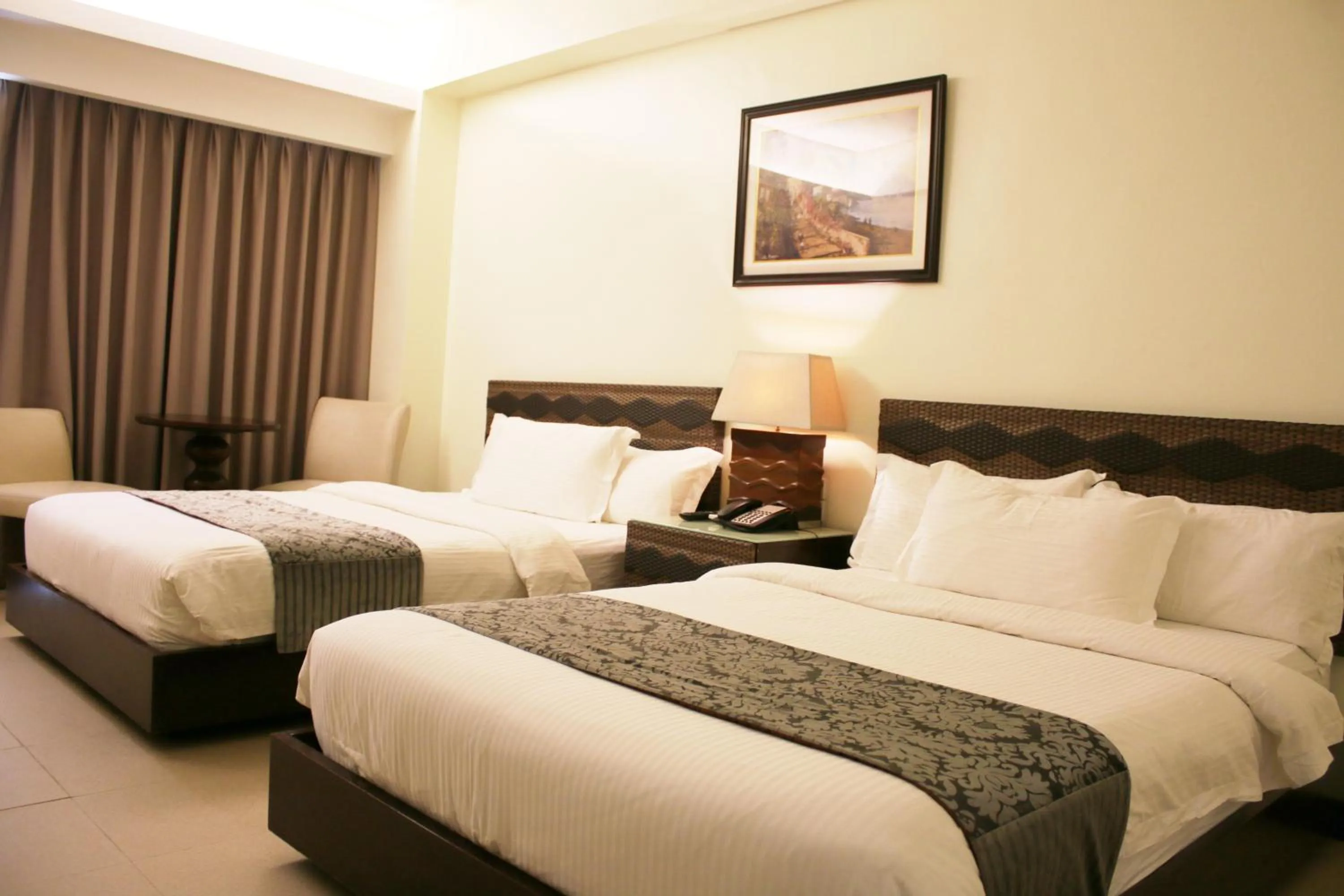 Bed in The Muse Beach Front Hotel Boracay