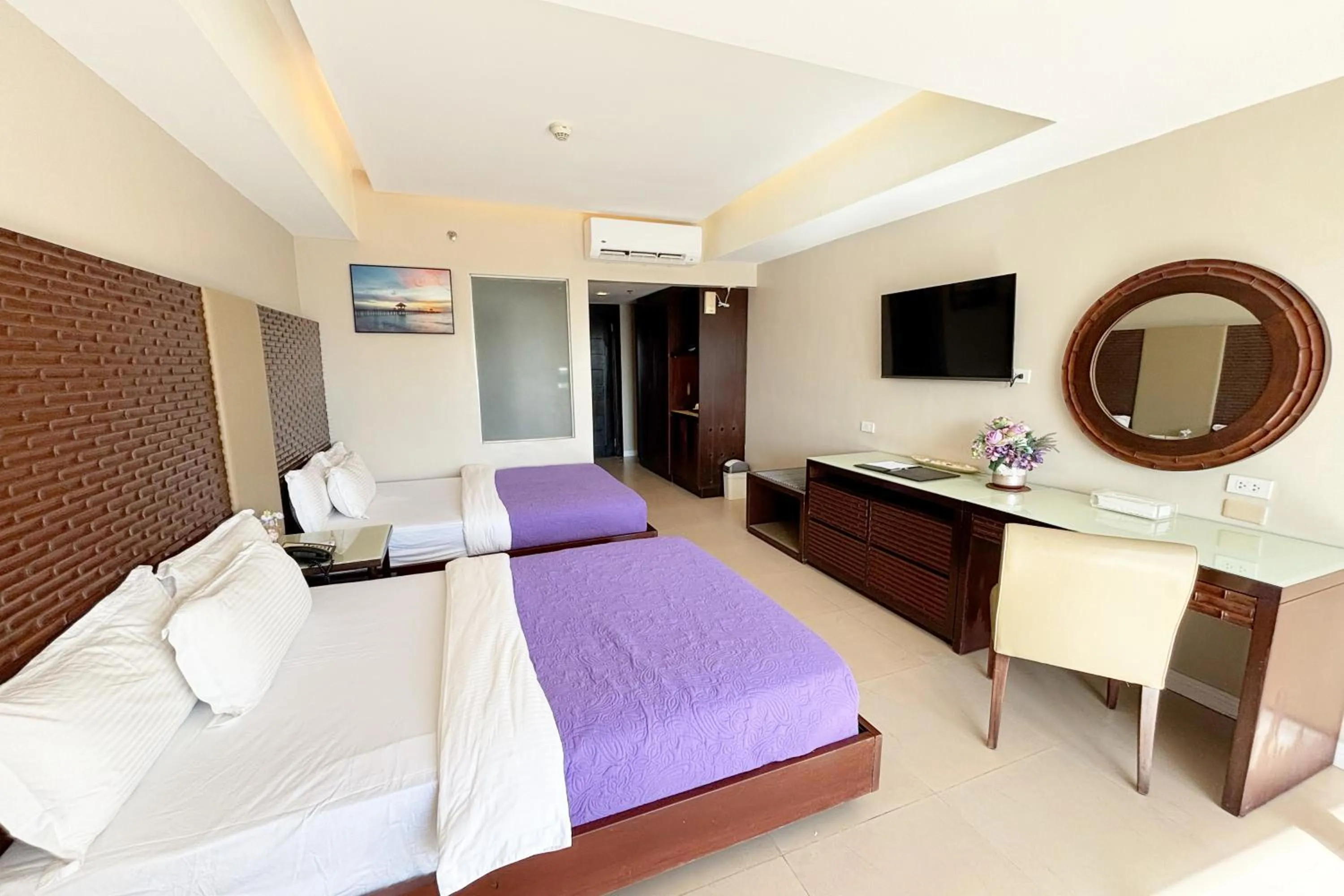 Bed in The Muse Beach Front Hotel Boracay