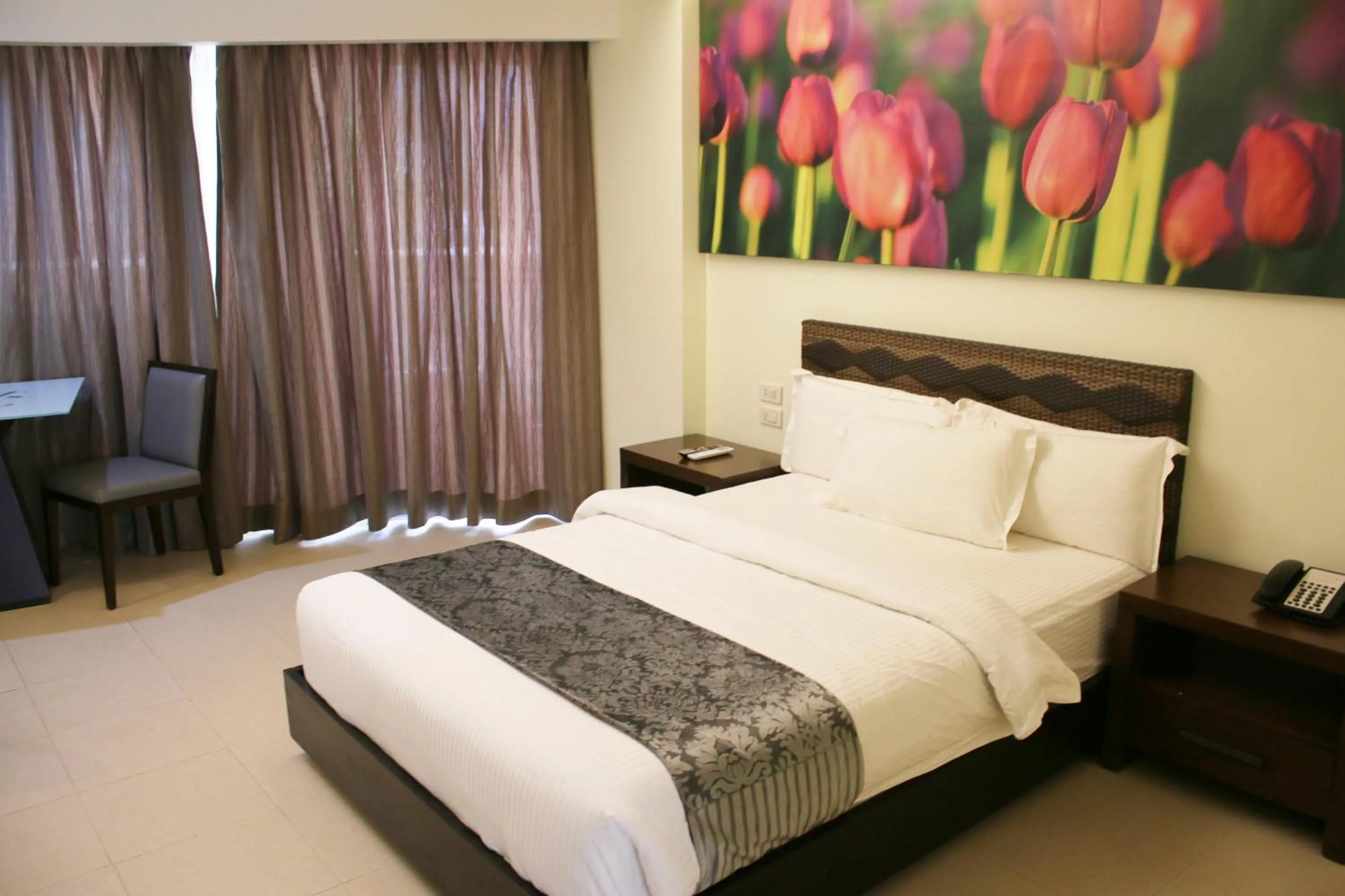 Bed in The Muse Beach Front Hotel Boracay