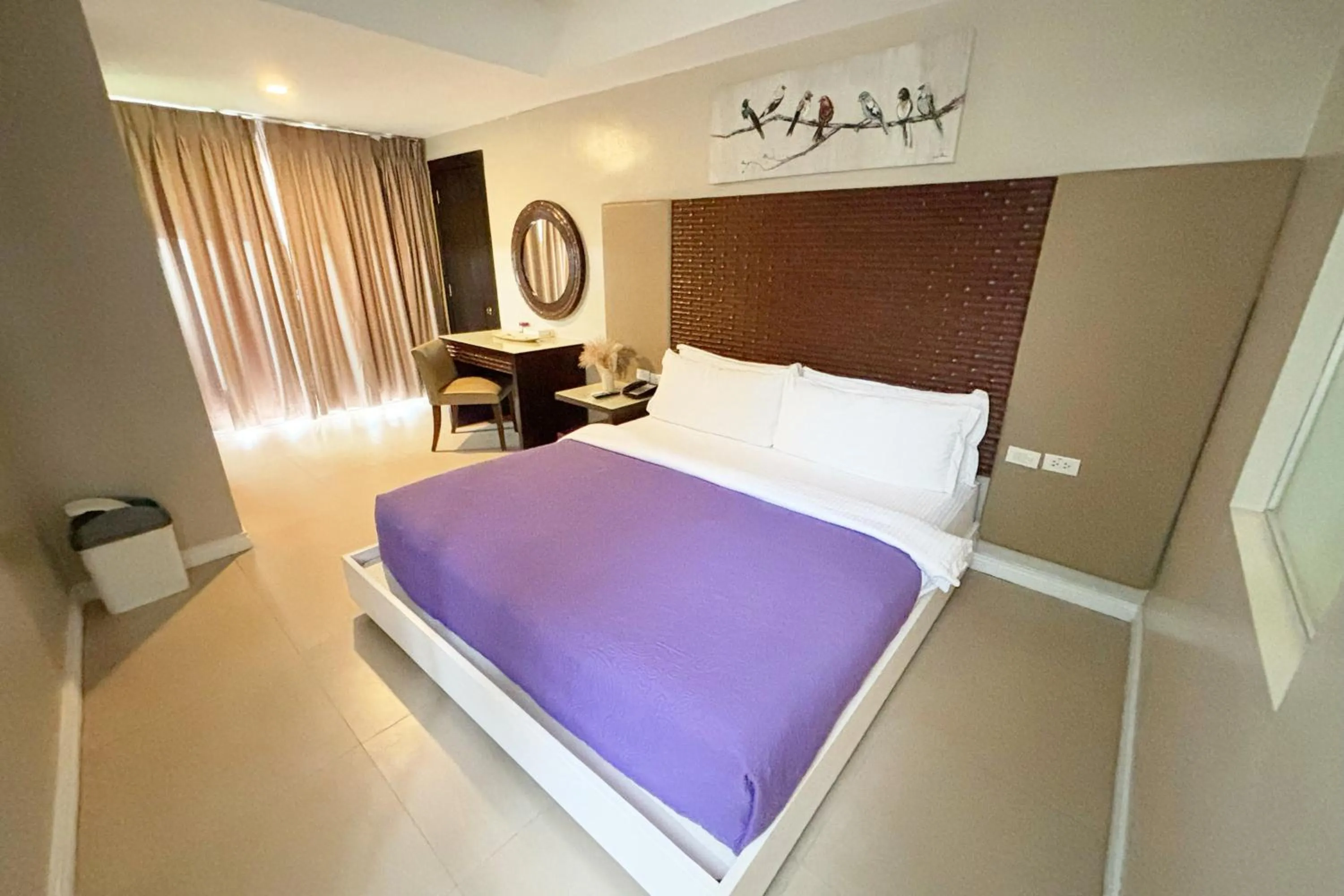 Bed in The Muse Beach Front Hotel Boracay