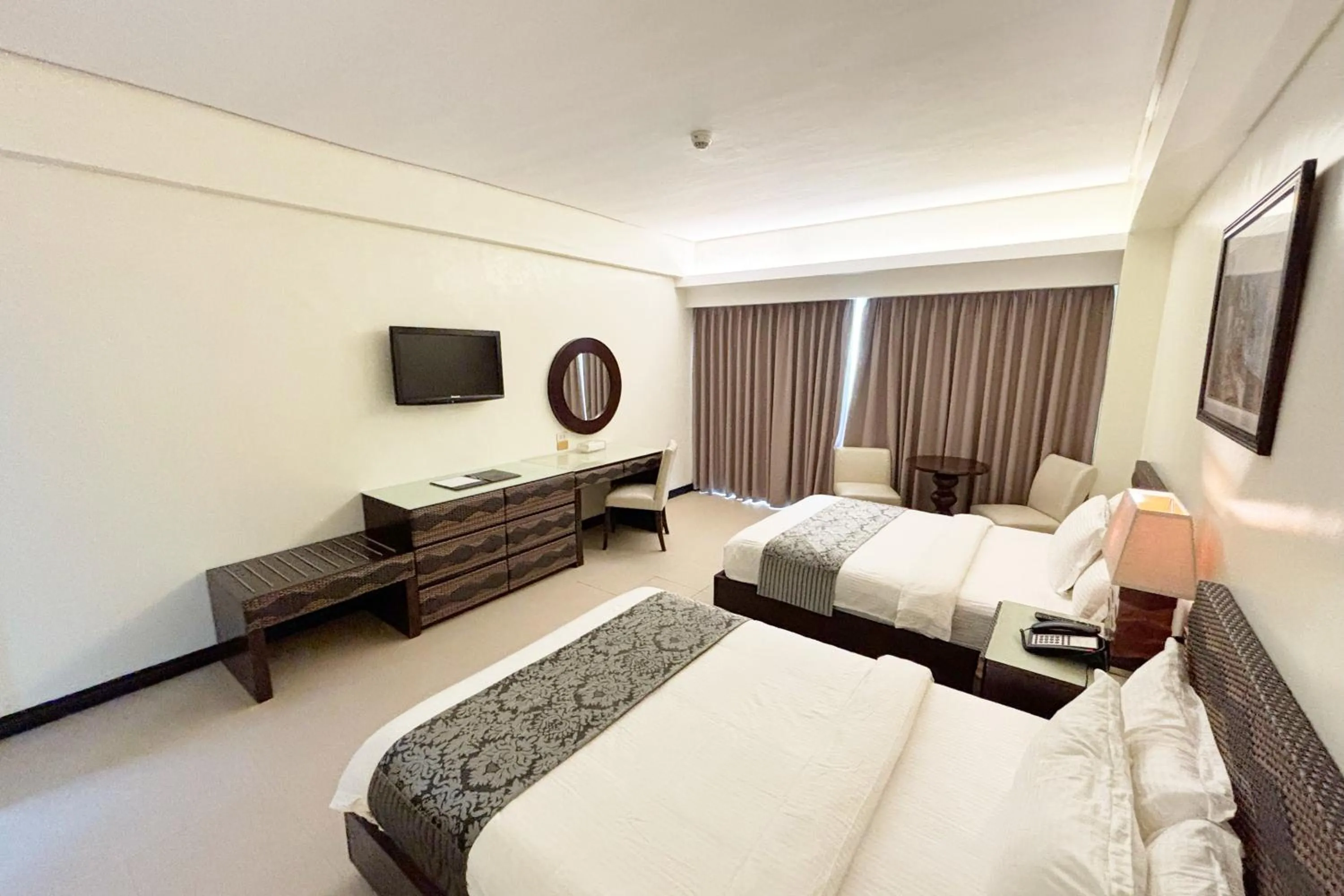 Bed in The Muse Beach Front Hotel Boracay