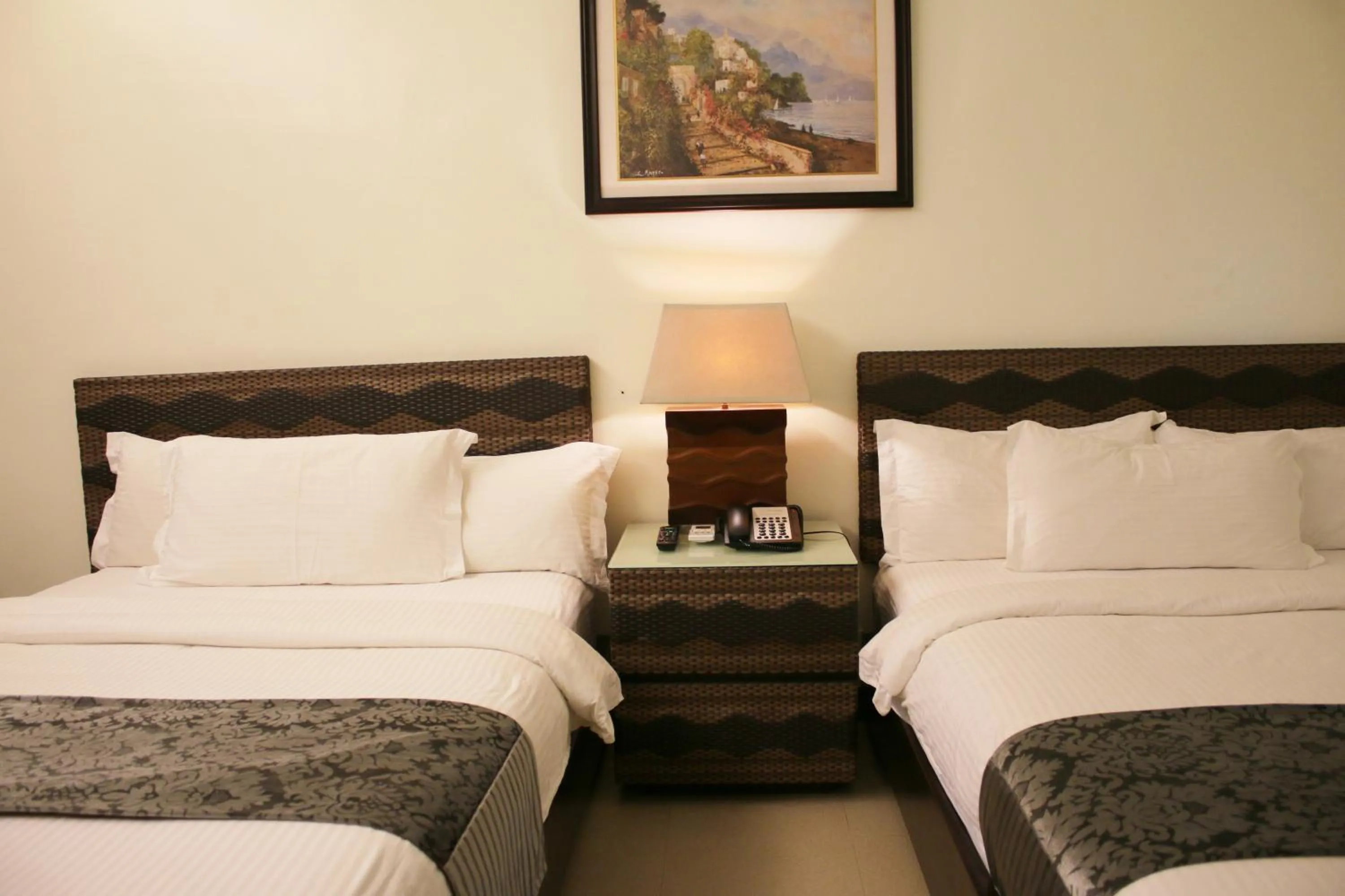 Bed in The Muse Beach Front Hotel Boracay