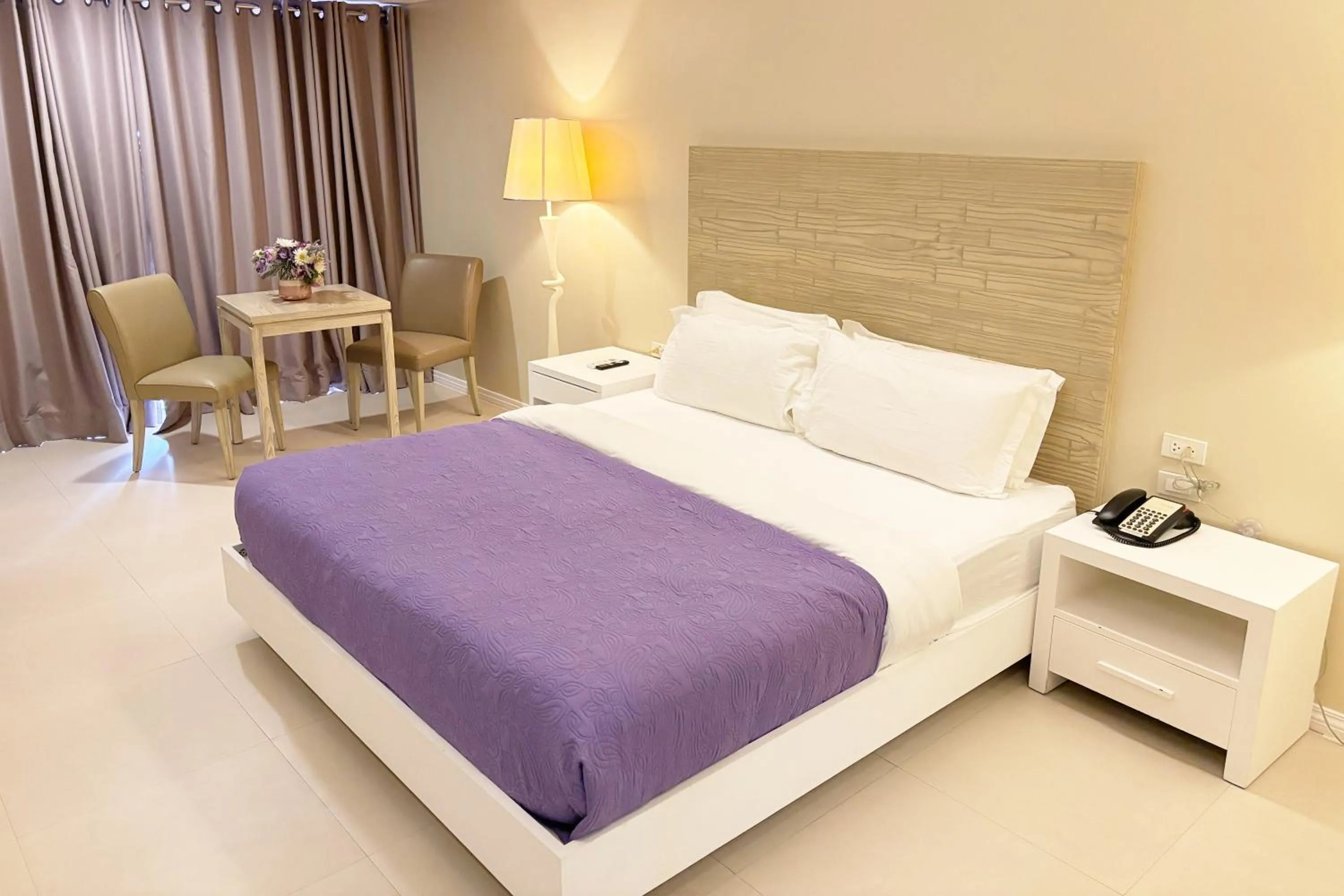 Bed in The Muse Beach Front Hotel Boracay