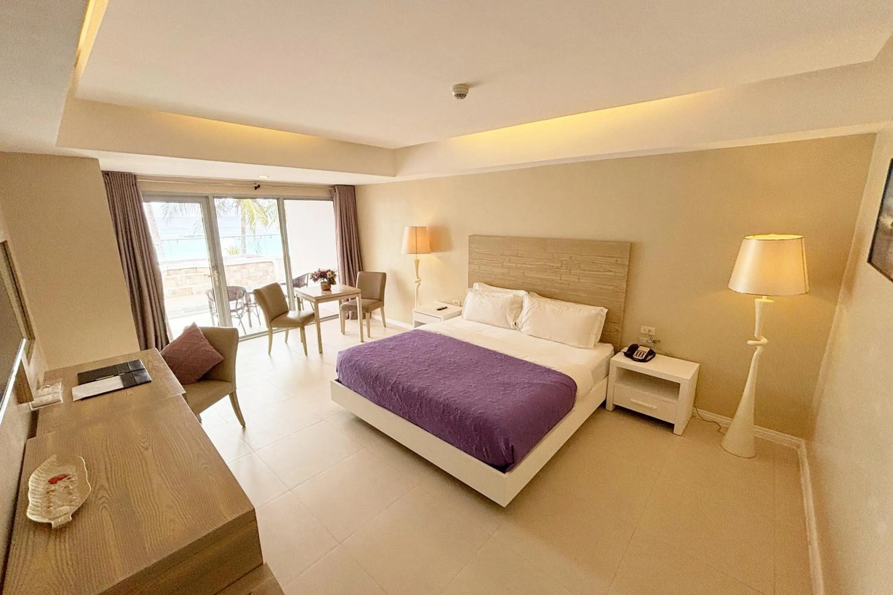 Bed in The Muse Beach Front Hotel Boracay