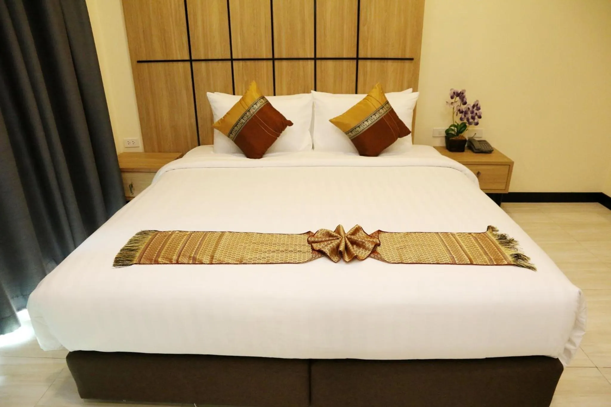 Bed in Crystal Palace Luxury Hotel Pattaya
