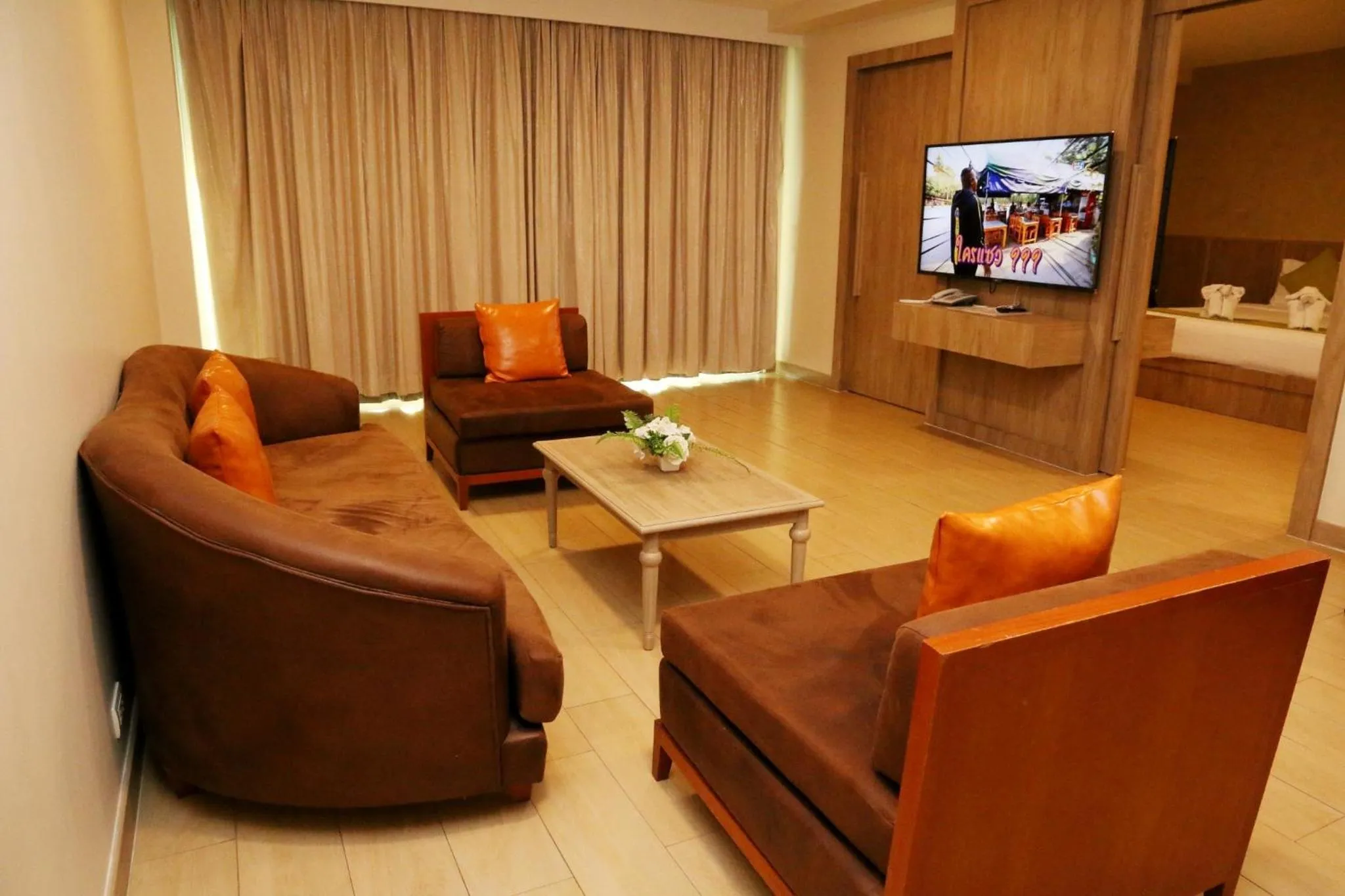 Communal lounge/ TV room in Crystal Palace Luxury Hotel Pattaya