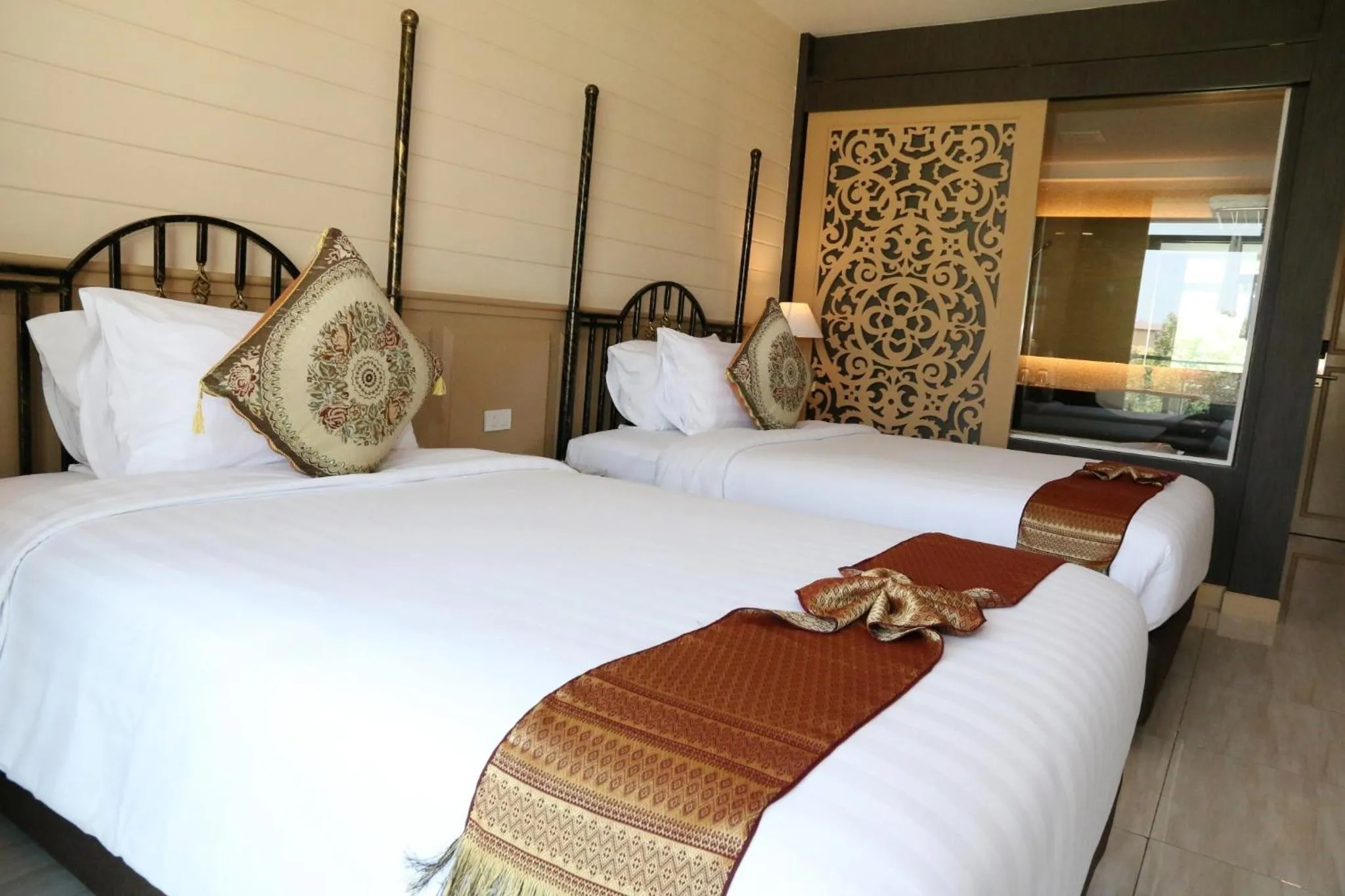 Bed in Crystal Palace Luxury Hotel Pattaya
