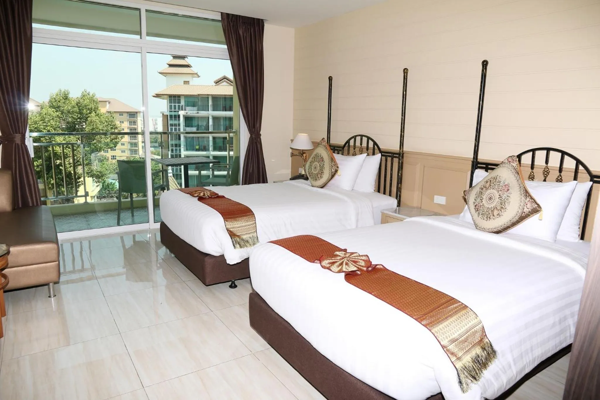 Bed in Crystal Palace Luxury Hotel Pattaya