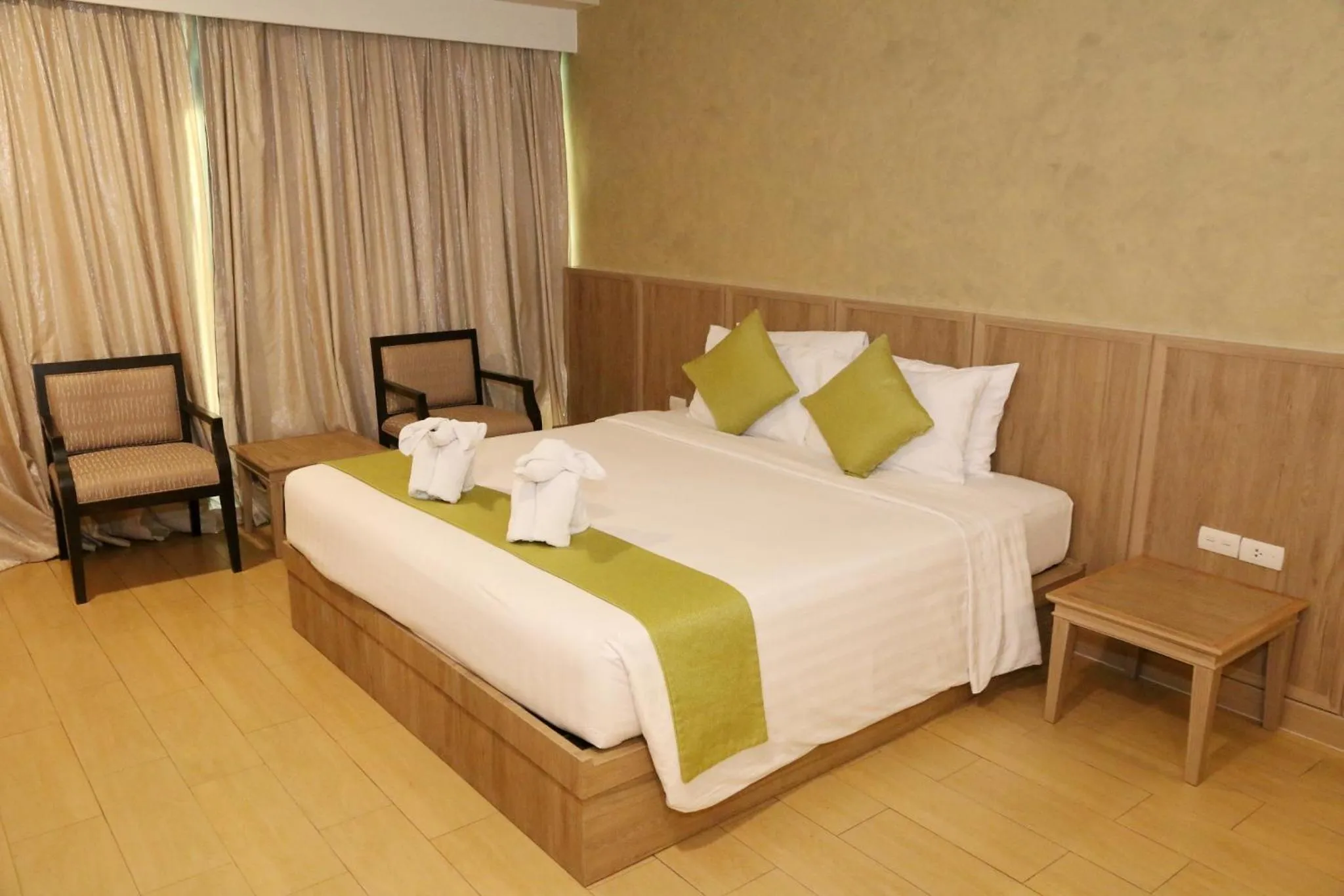 Bed in Crystal Palace Luxury Hotel Pattaya