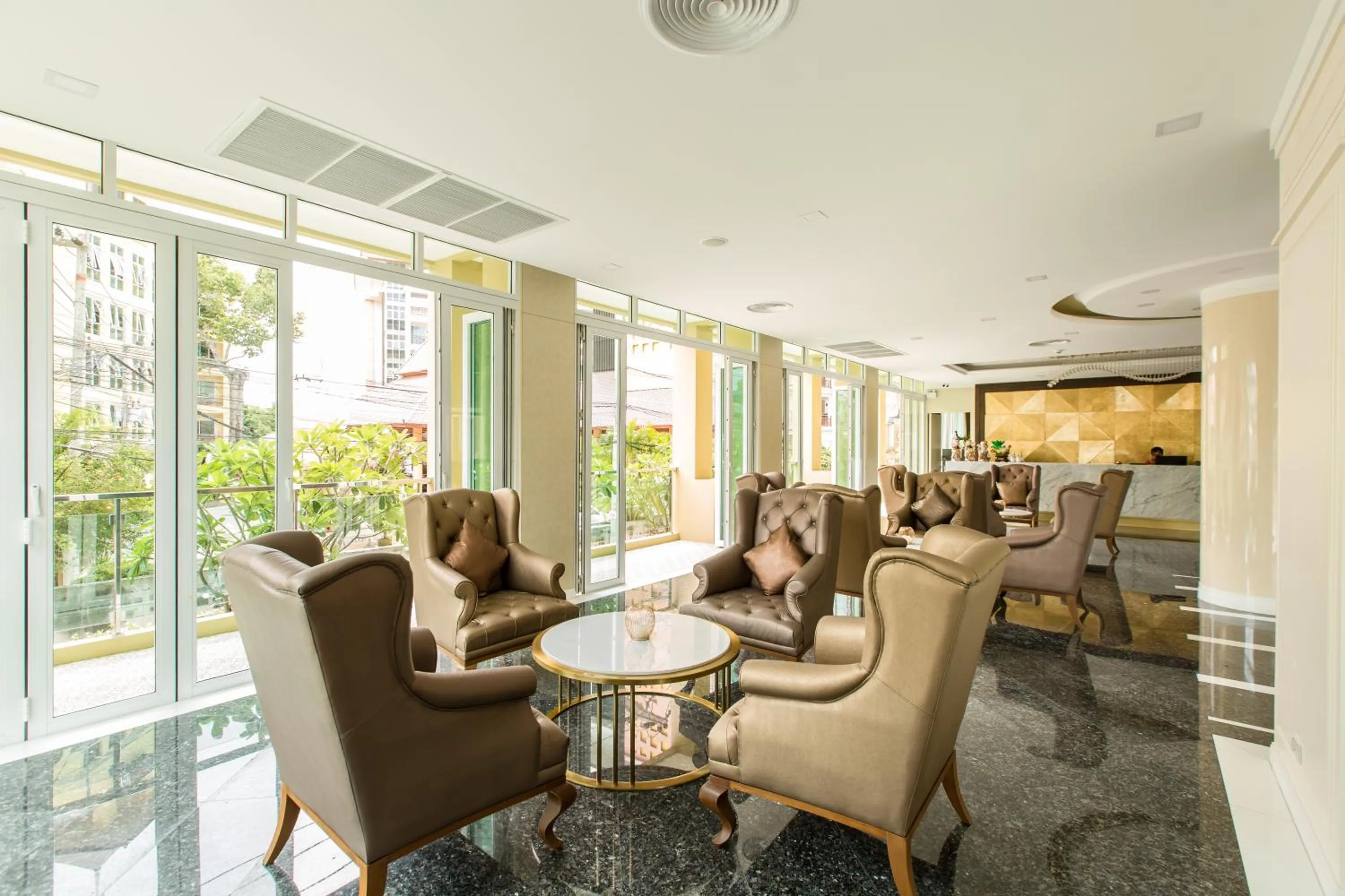 Seating area in Crystal Palace Luxury Hotel Pattaya