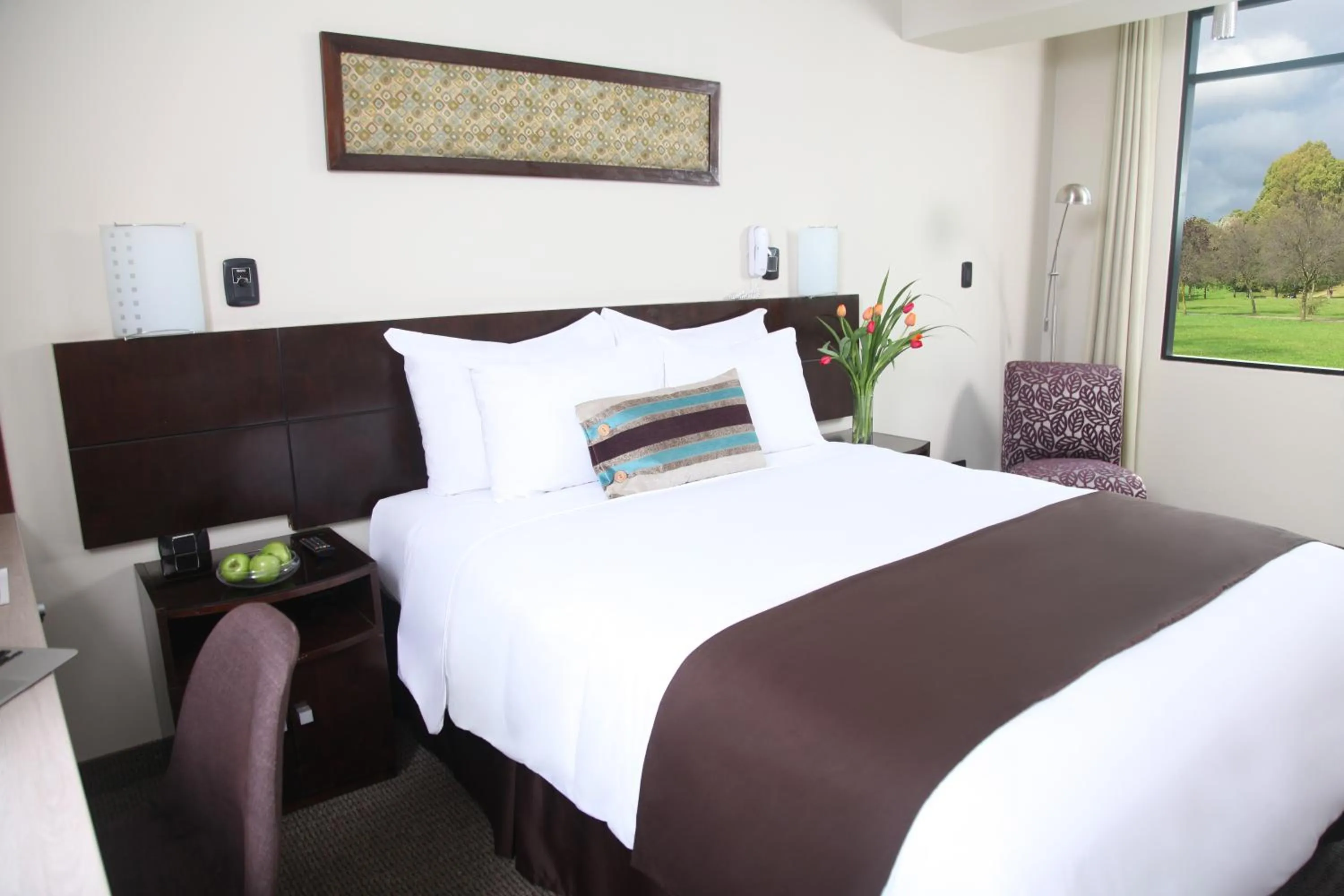 Bed in Hotel Rivera Inn