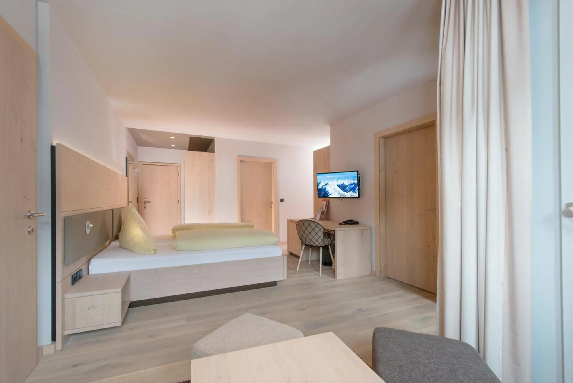 Bed in Familotel Alphotel