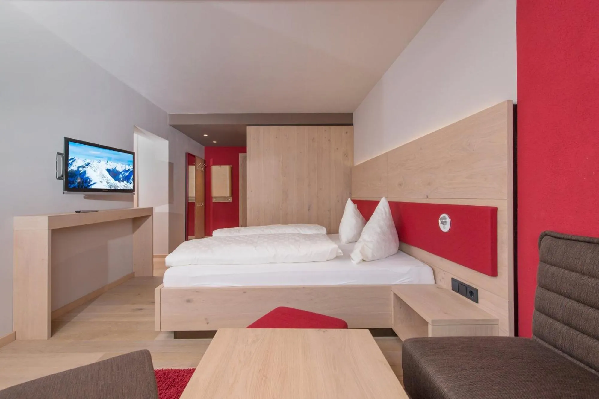 Bed in Familotel Alphotel