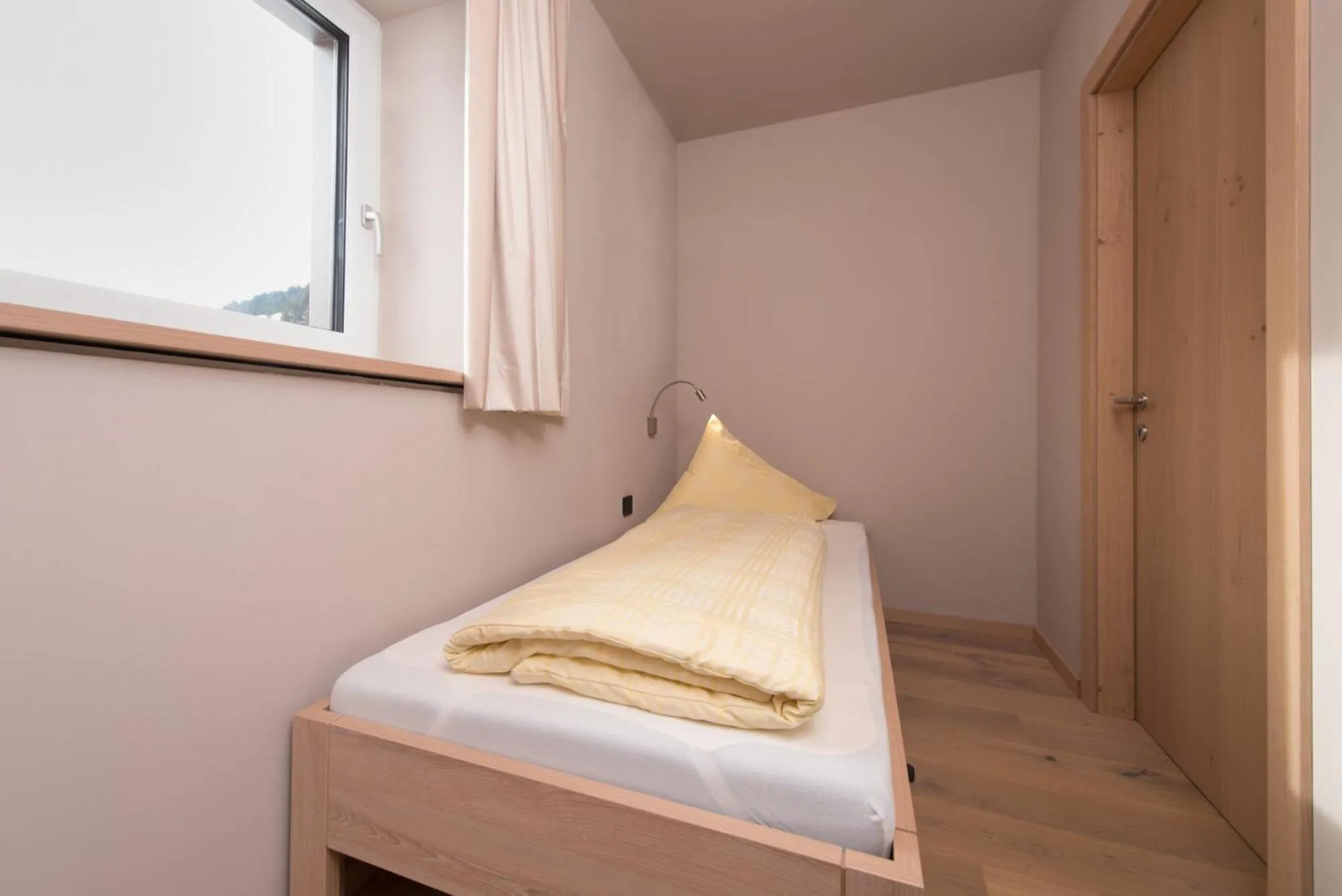 Bed in Familotel Alphotel