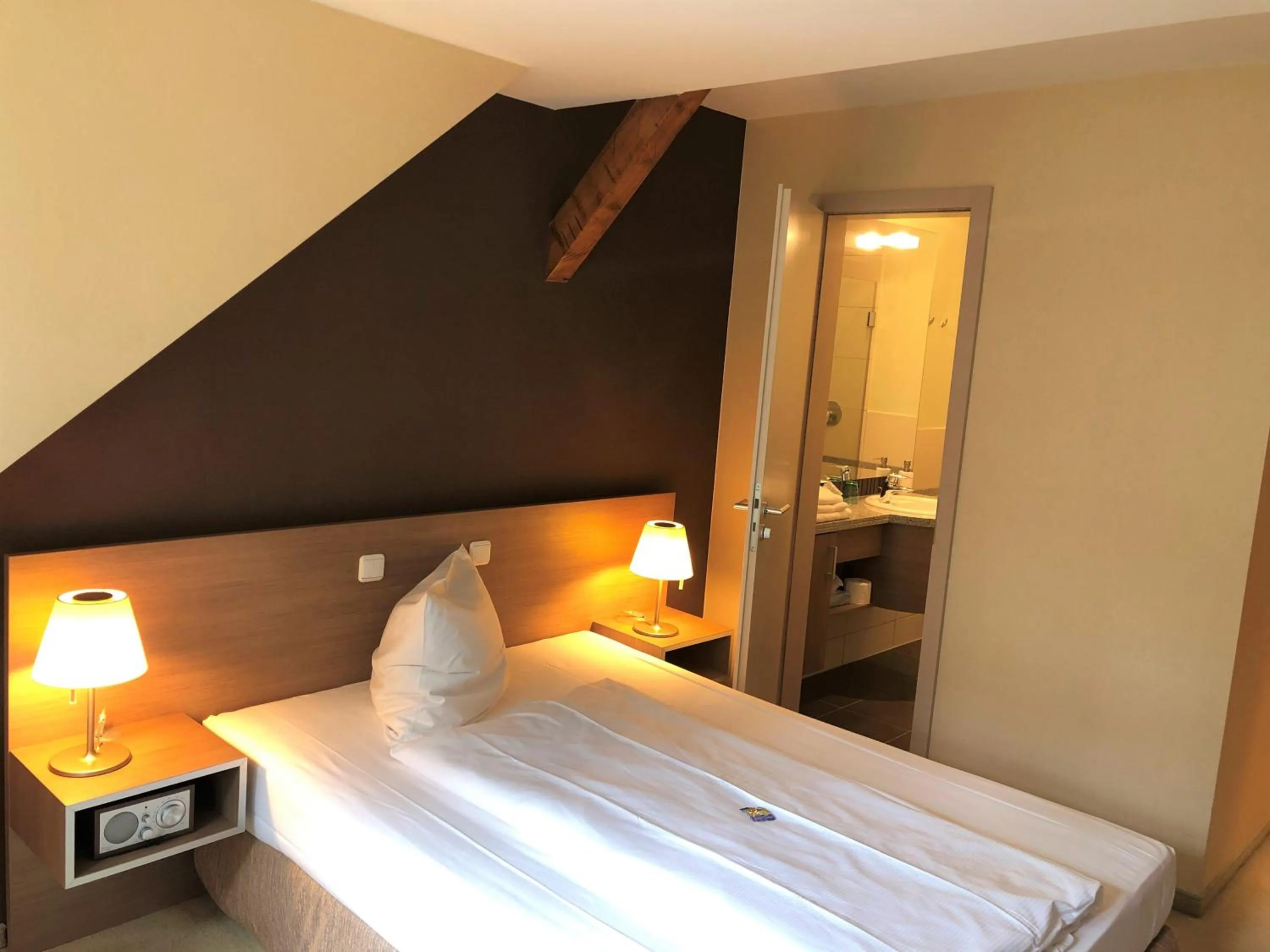 Shower, Bed in Hotel Seeblick