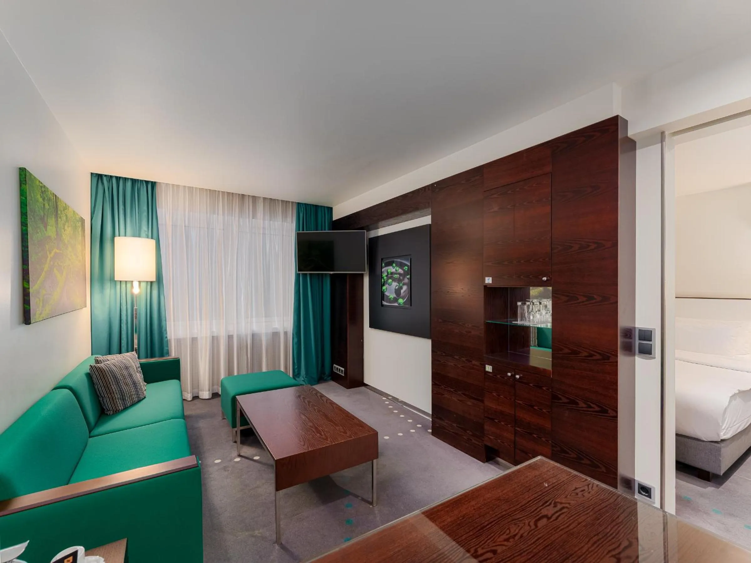 Living room, Bed in Radisson Blu Hotel Olümpia