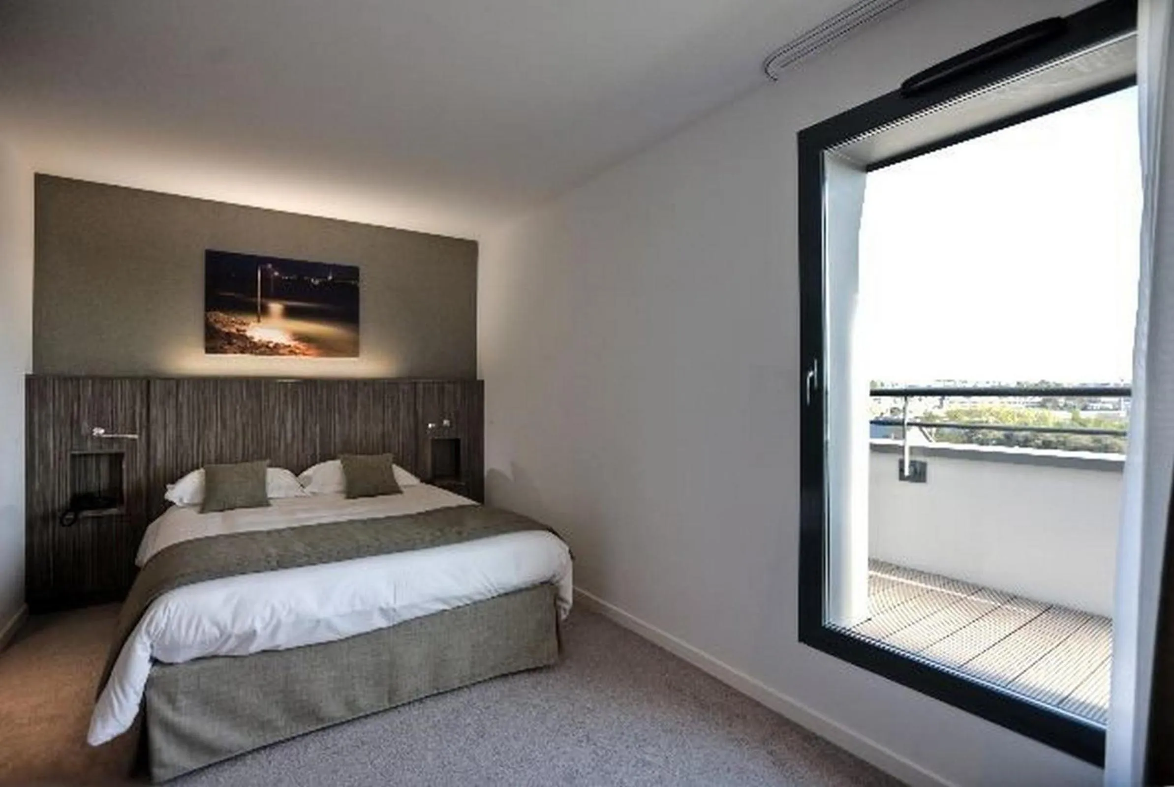 Bed in Mercure Saint Malo Balmoral