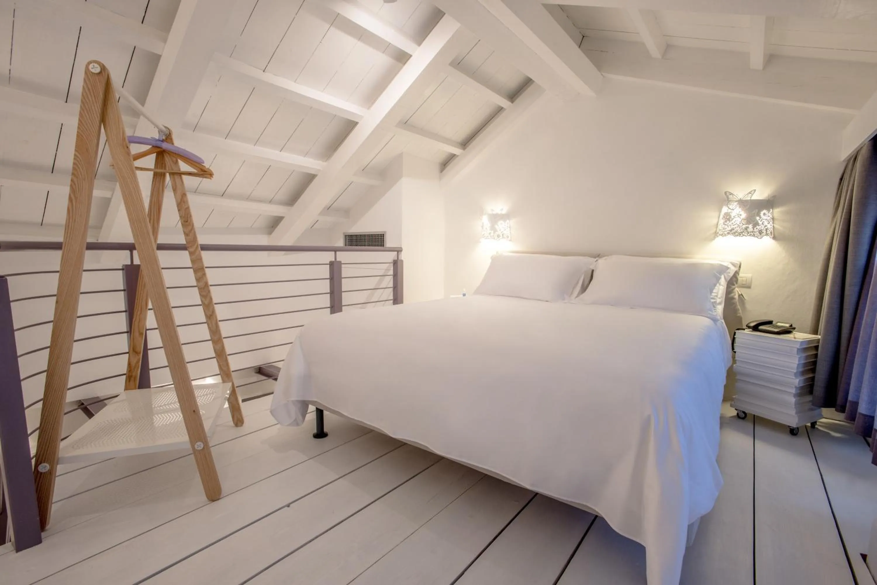 Bed in Uve Rooms & Wine Bar