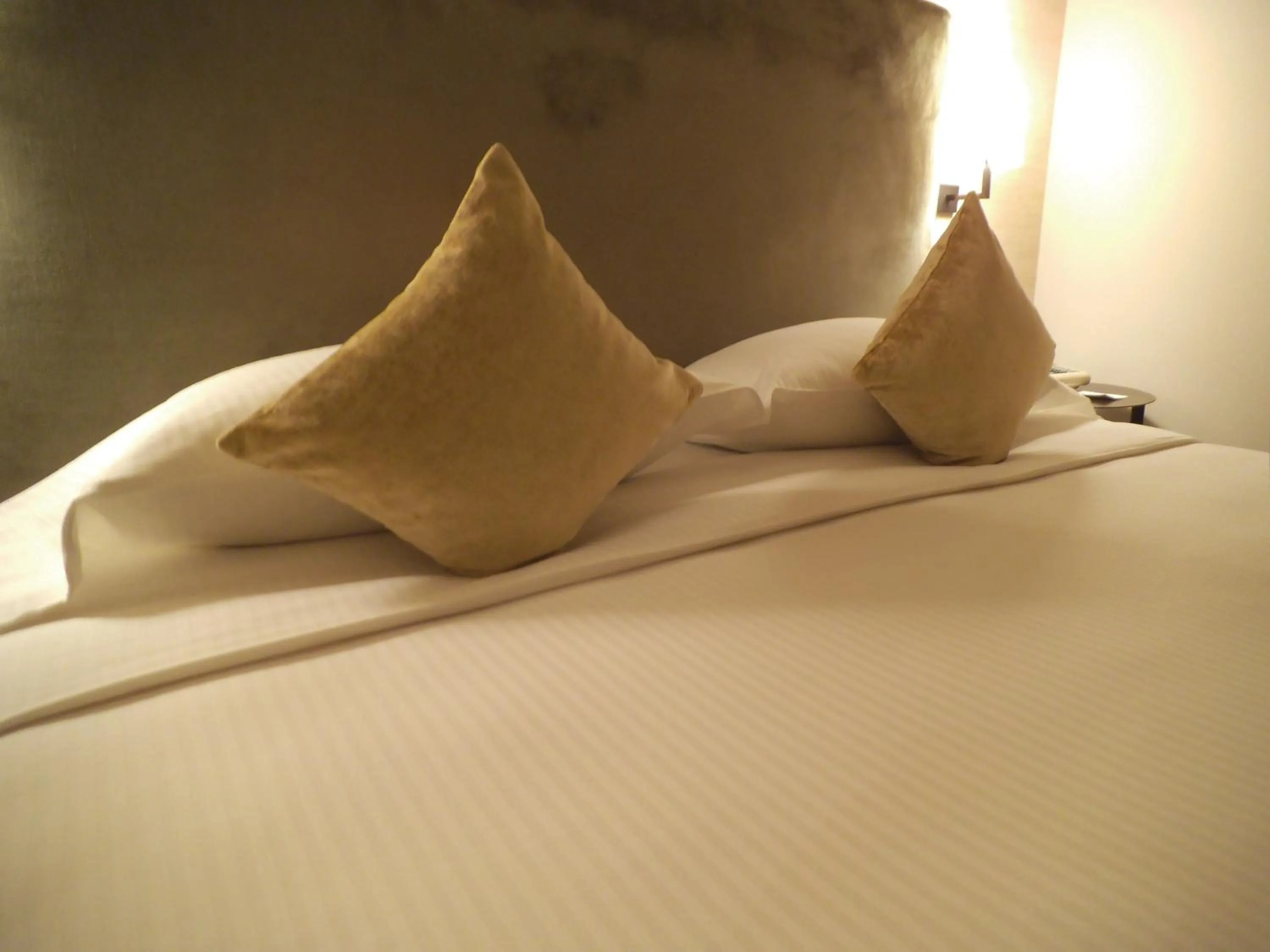 Bed in Hotel Ariston & Apartments