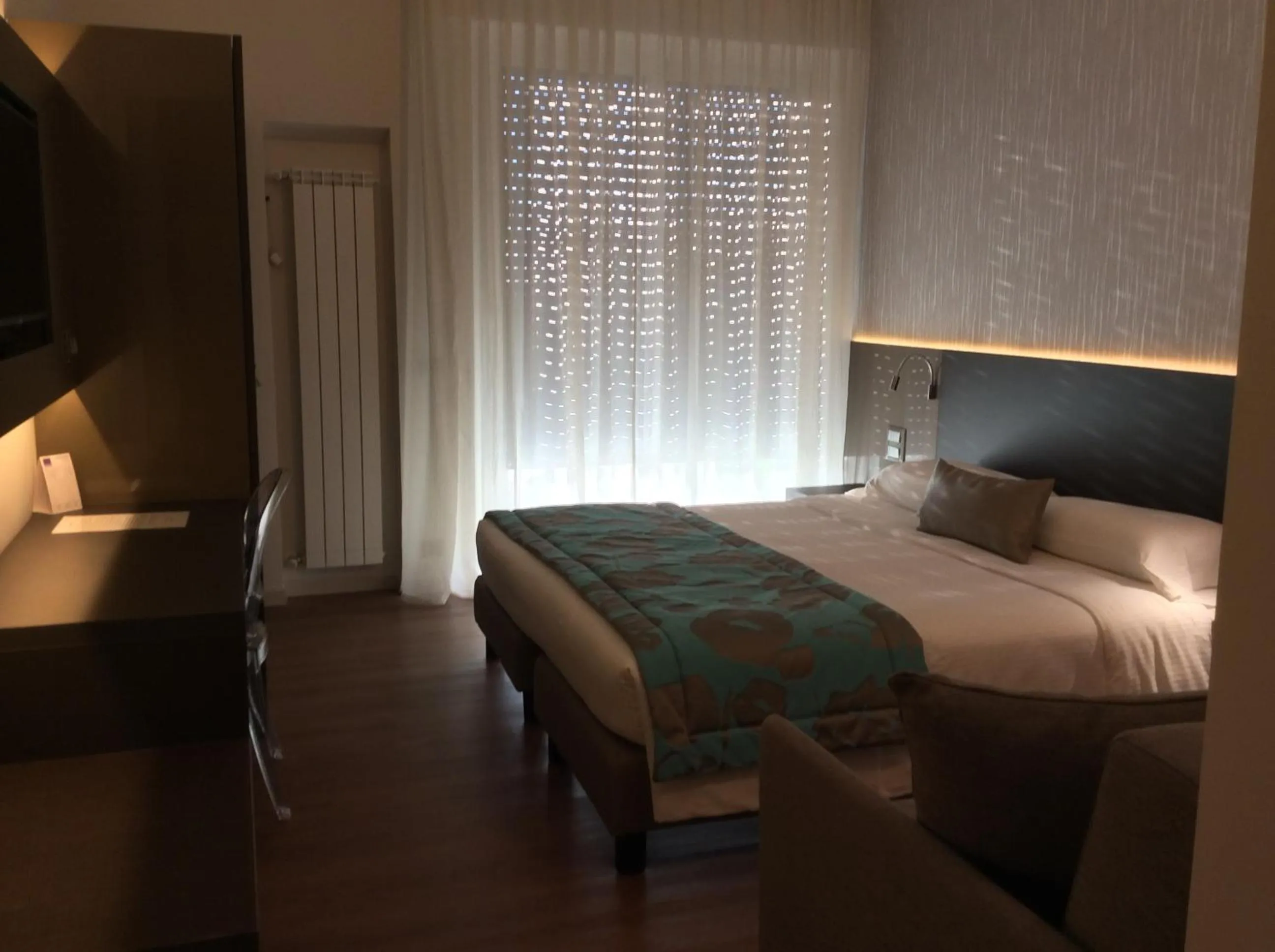 Decorative detail, Bed in Hotel Ariston & Apartments