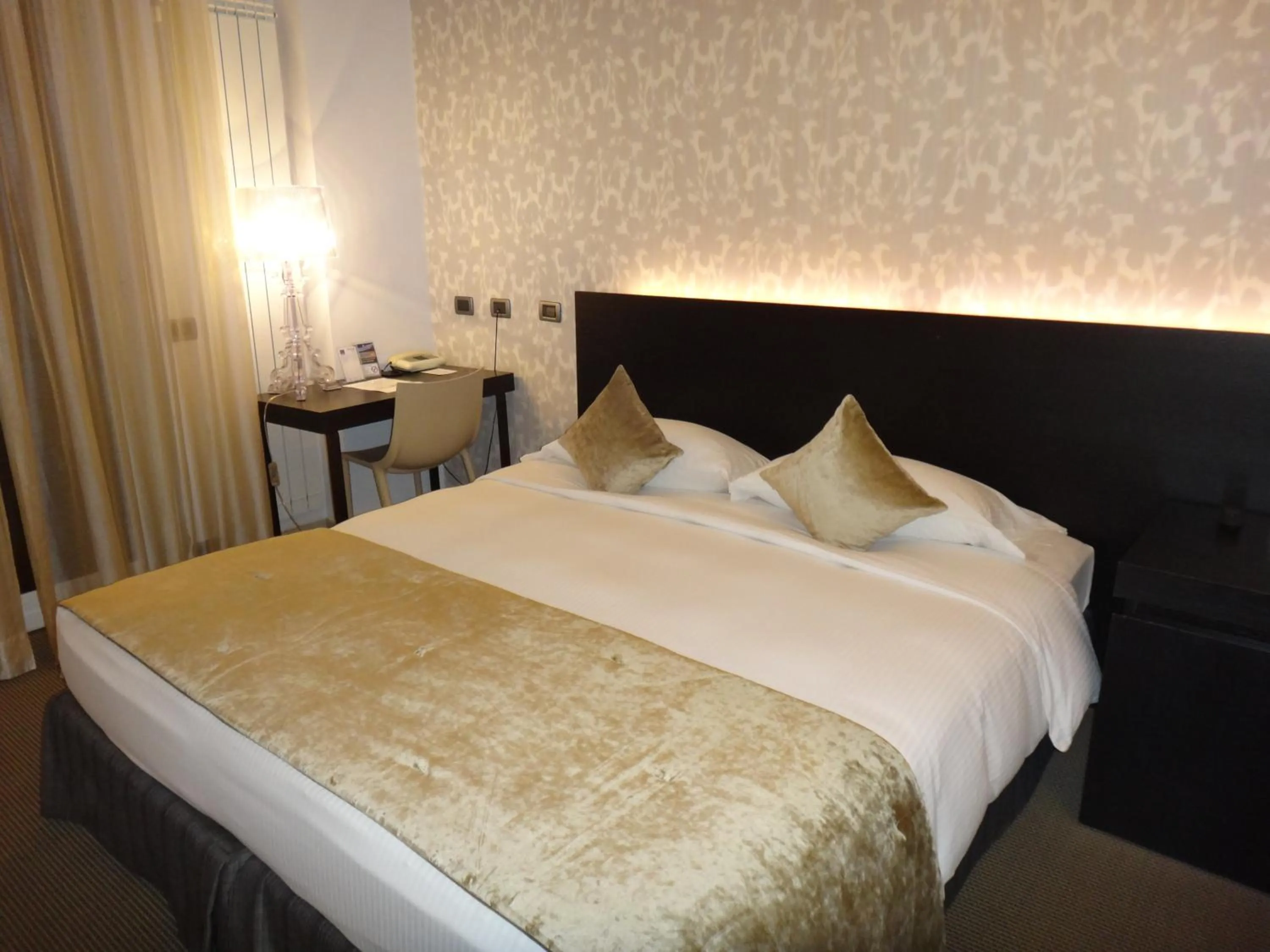 Bed in Hotel Ariston & Apartments