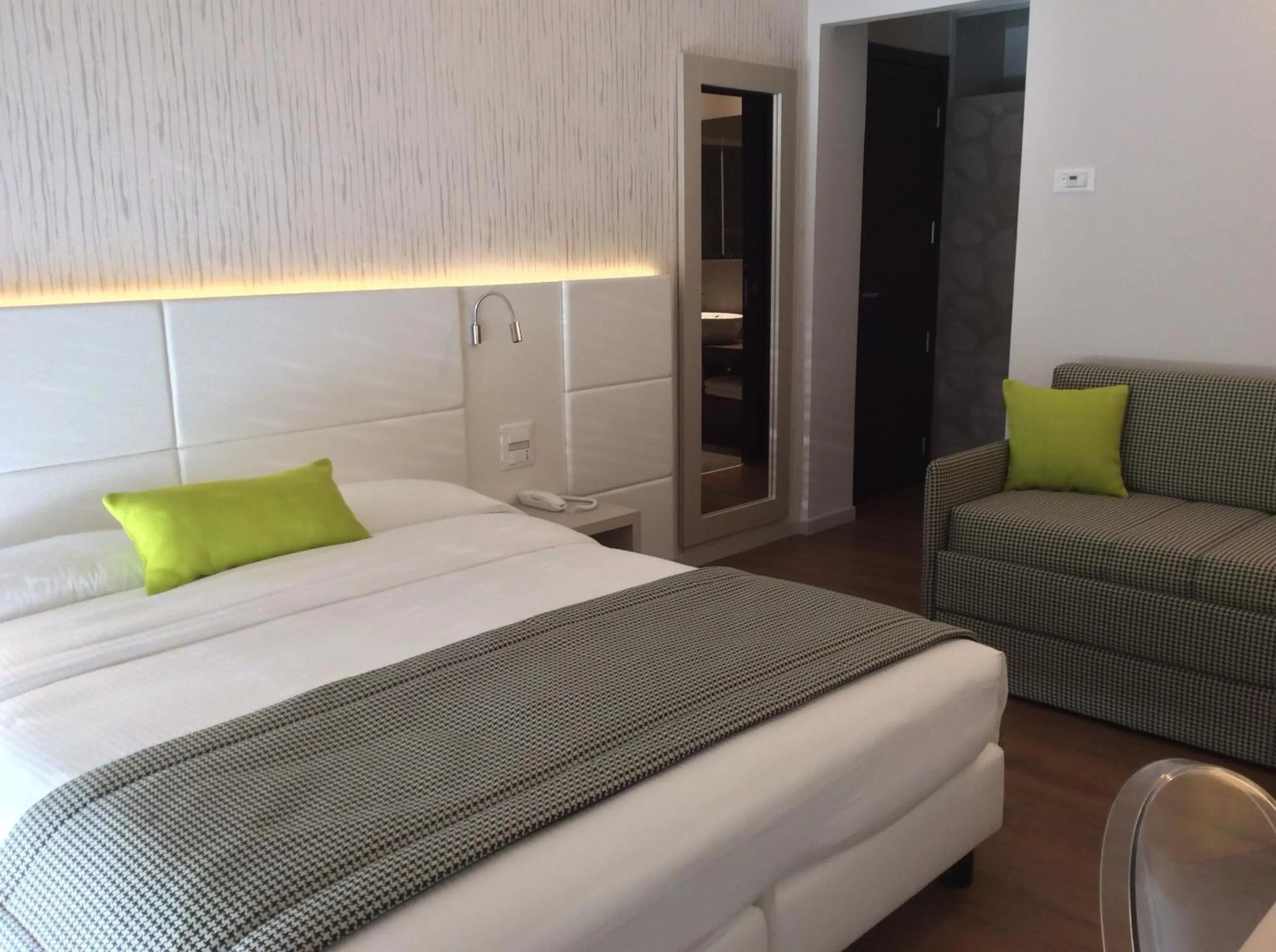 Decorative detail, Bed in Hotel Ariston & Apartments