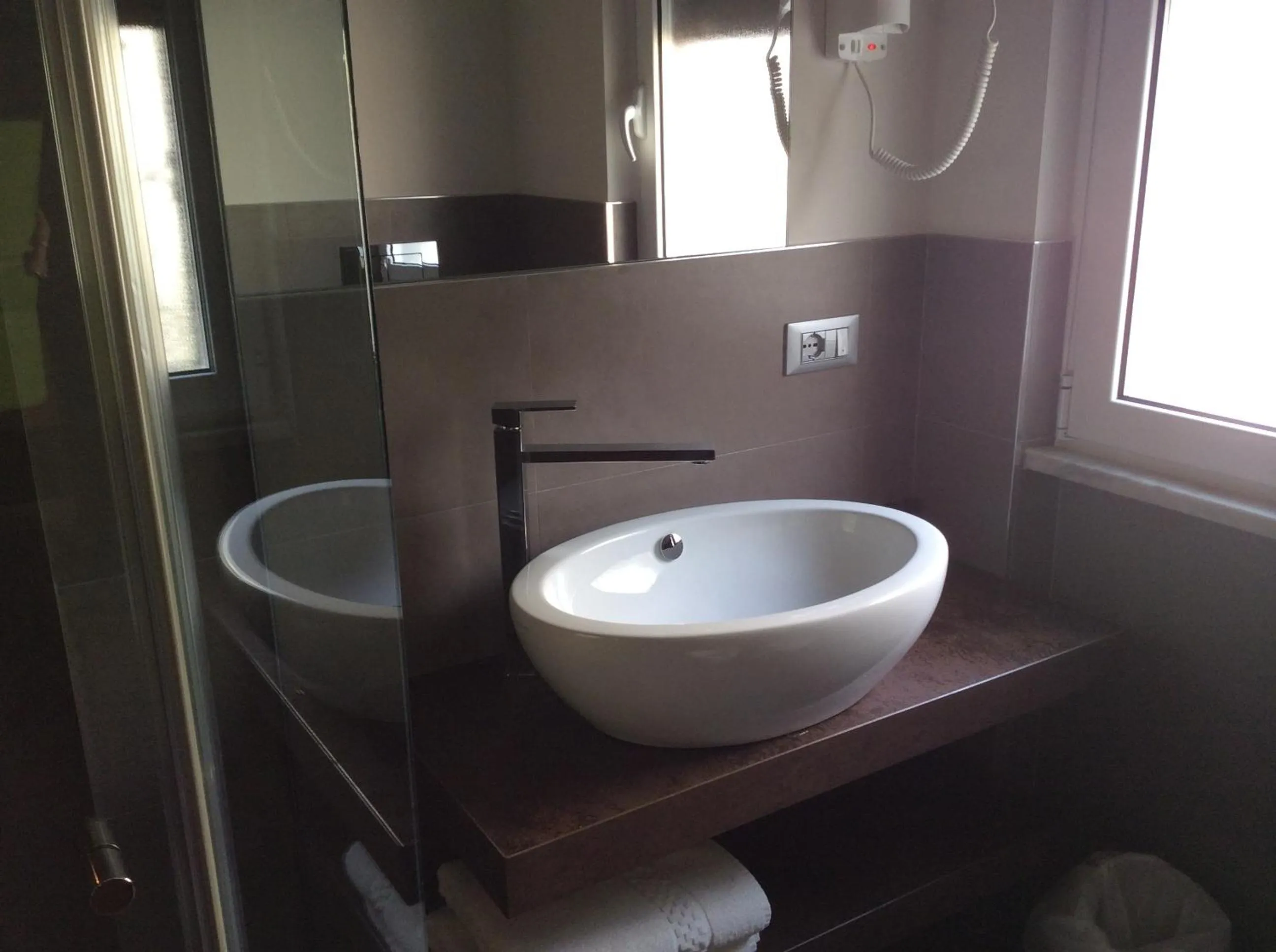 Bathroom in Hotel Ariston & Apartments